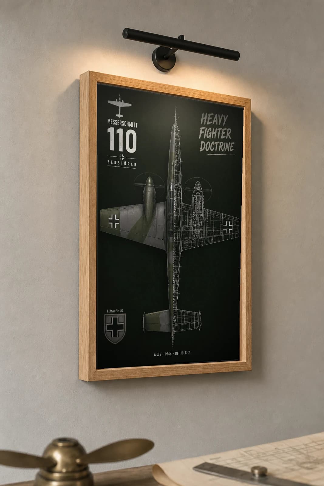 Messerschmitt Bf 110 Cutaway Poster — G-2 WW2 Split-View Blueprint Print — the framed print shown at a three-quarter angle on a styled gallery wall in a natural-oak frame