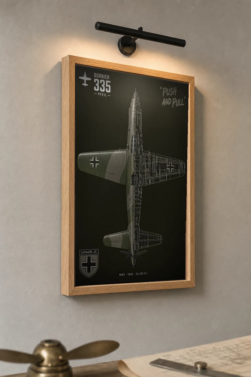 Dornier Do 335 Cutaway Poster — Do 335 A-1 Pfeil WW2 Split-View Blueprint Print — the framed print shown at a three-quarter angle on a styled gallery wall in a natural-oak frame
