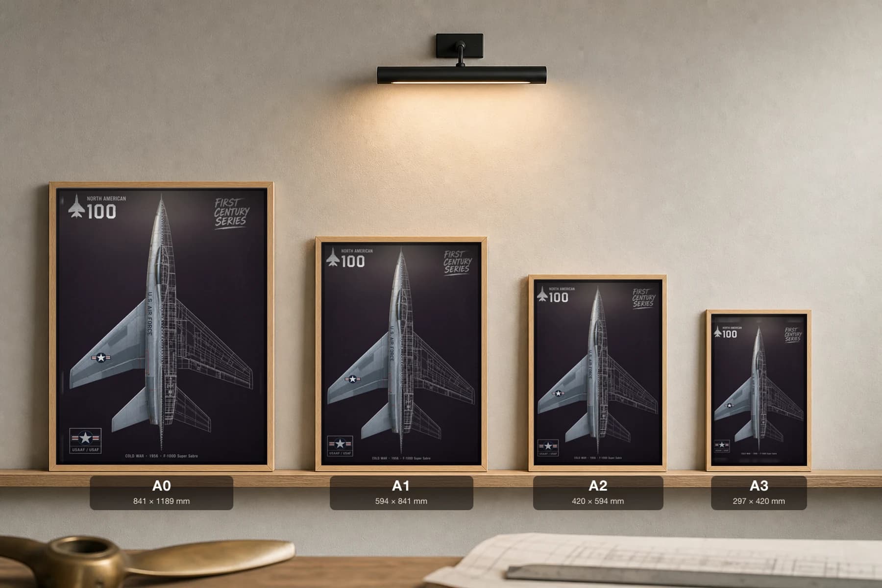 F-100 Super Sabre Cutaway Poster — F-100D Cold War Split-View Blueprint Print — print size guide showing the artwork at A0, A1, A2 and A3 in natural-oak frames at true relative scale