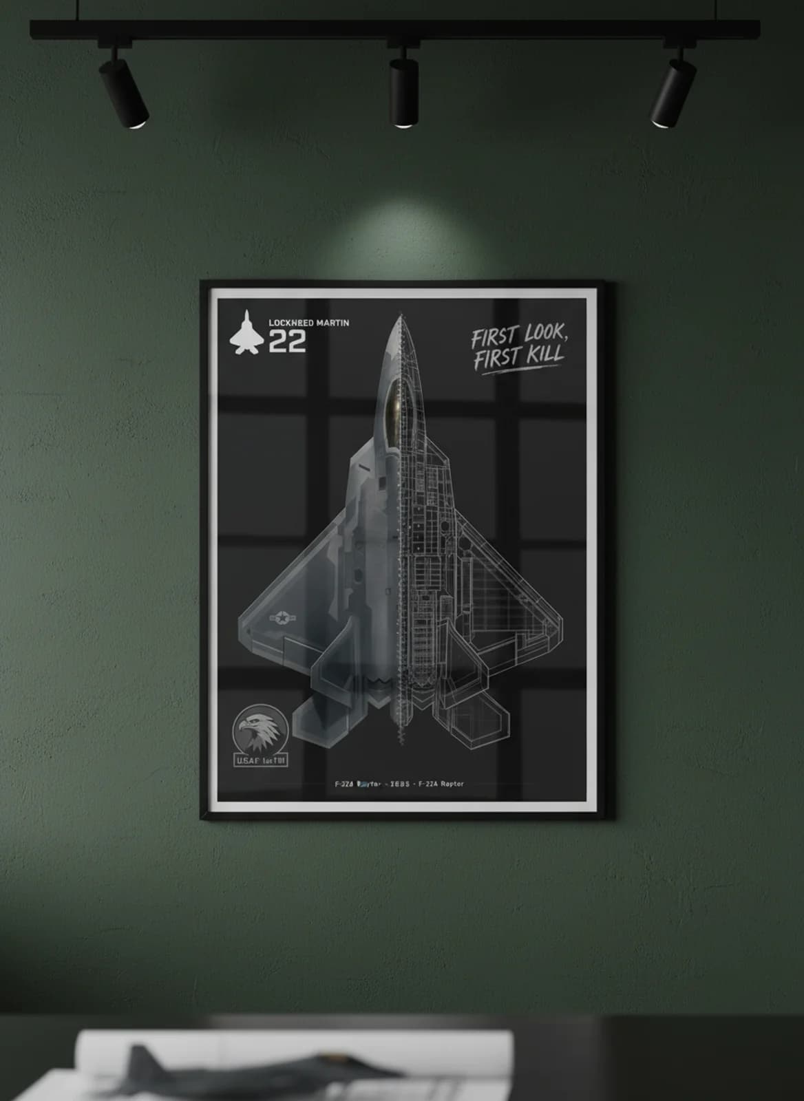 F-22A Raptor — Aircraft Cutaway cutaway poster in black A2 frame on low-observable-matte-grey deep forest wall — Aircraft Cutaways enthusiast study mockup