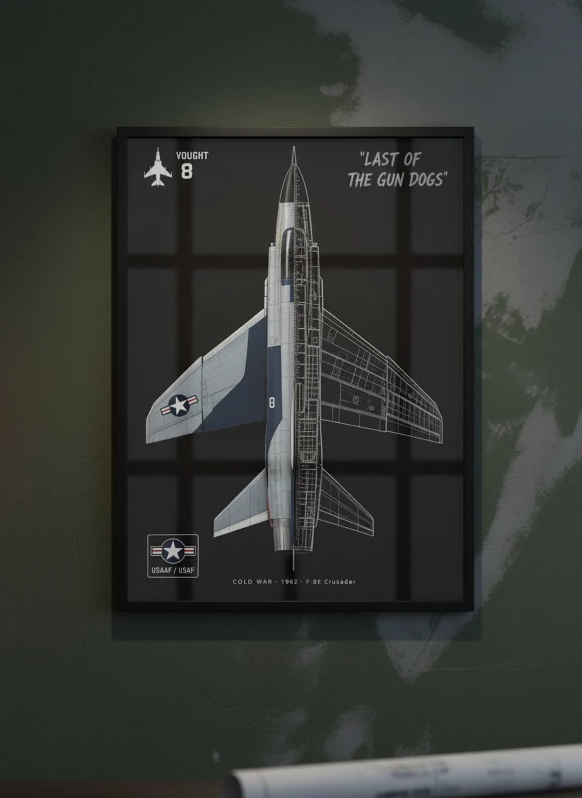 F-8E Crusader — Aircraft Cutaway cutaway poster in black A2 frame on light-grey-camouflage deep forest wall — Aircraft Cutaways enthusiast study mockup