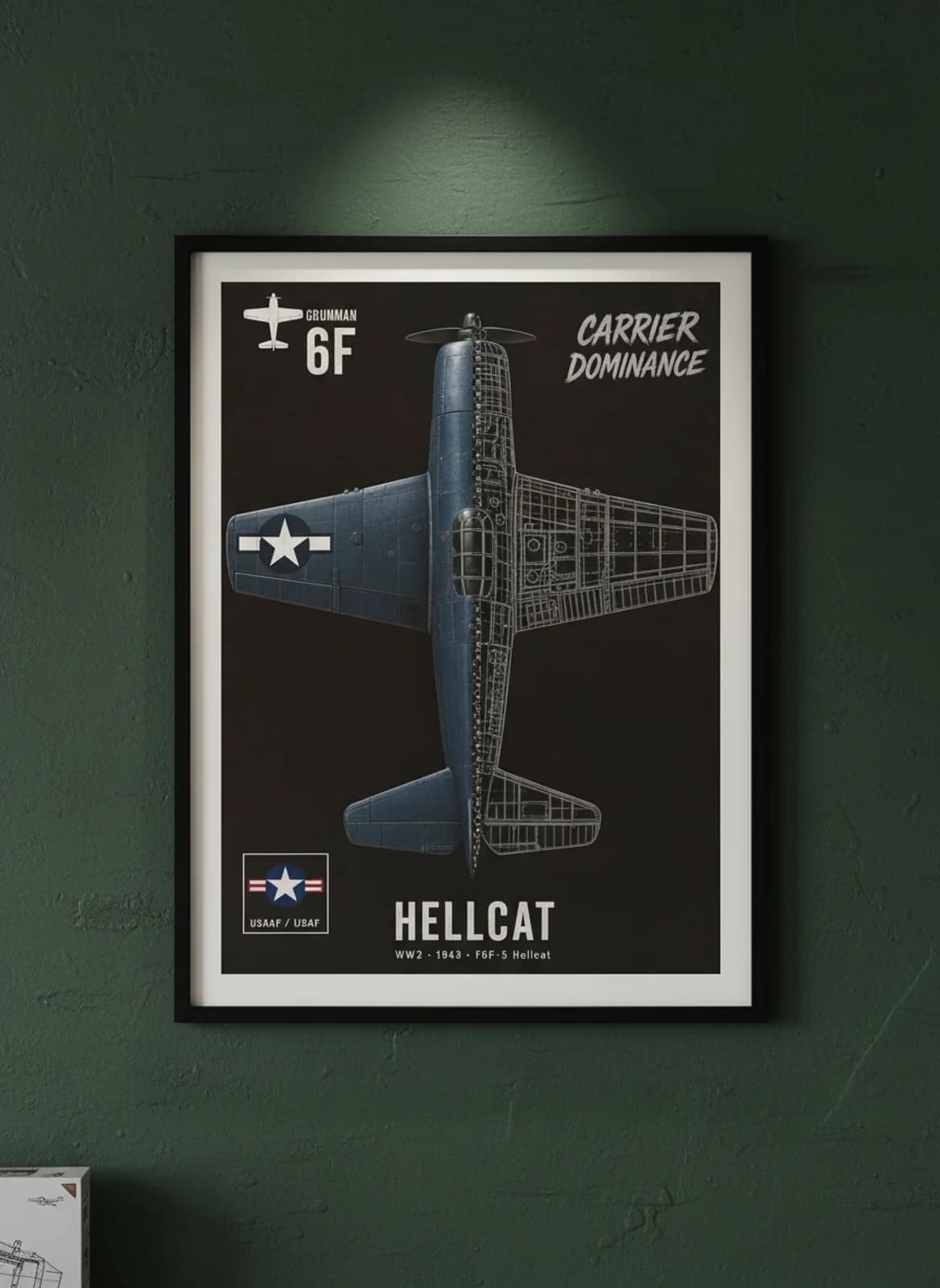 F6F-5 Hellcat cutaway poster in black A2 frame on navy-blue-livery deep forest wall — Aircraft Cutaways enthusiast study mockup