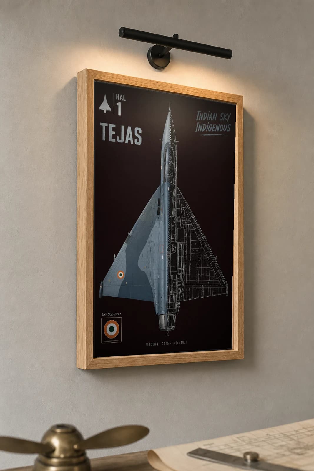 HAL Tejas Cutaway Poster — Tejas Mk 1 Modern Split-View Blueprint Print — the framed print shown at a three-quarter angle on a styled gallery wall in a natural-oak frame