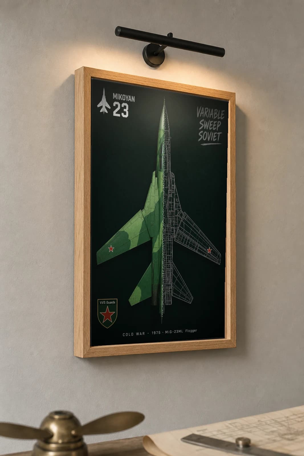 MiG-23 Cutaway Poster — MiG-23ML Flogger Cold War Split-View Blueprint Print — the framed print shown at a three-quarter angle on a styled gallery wall in a natural-oak frame