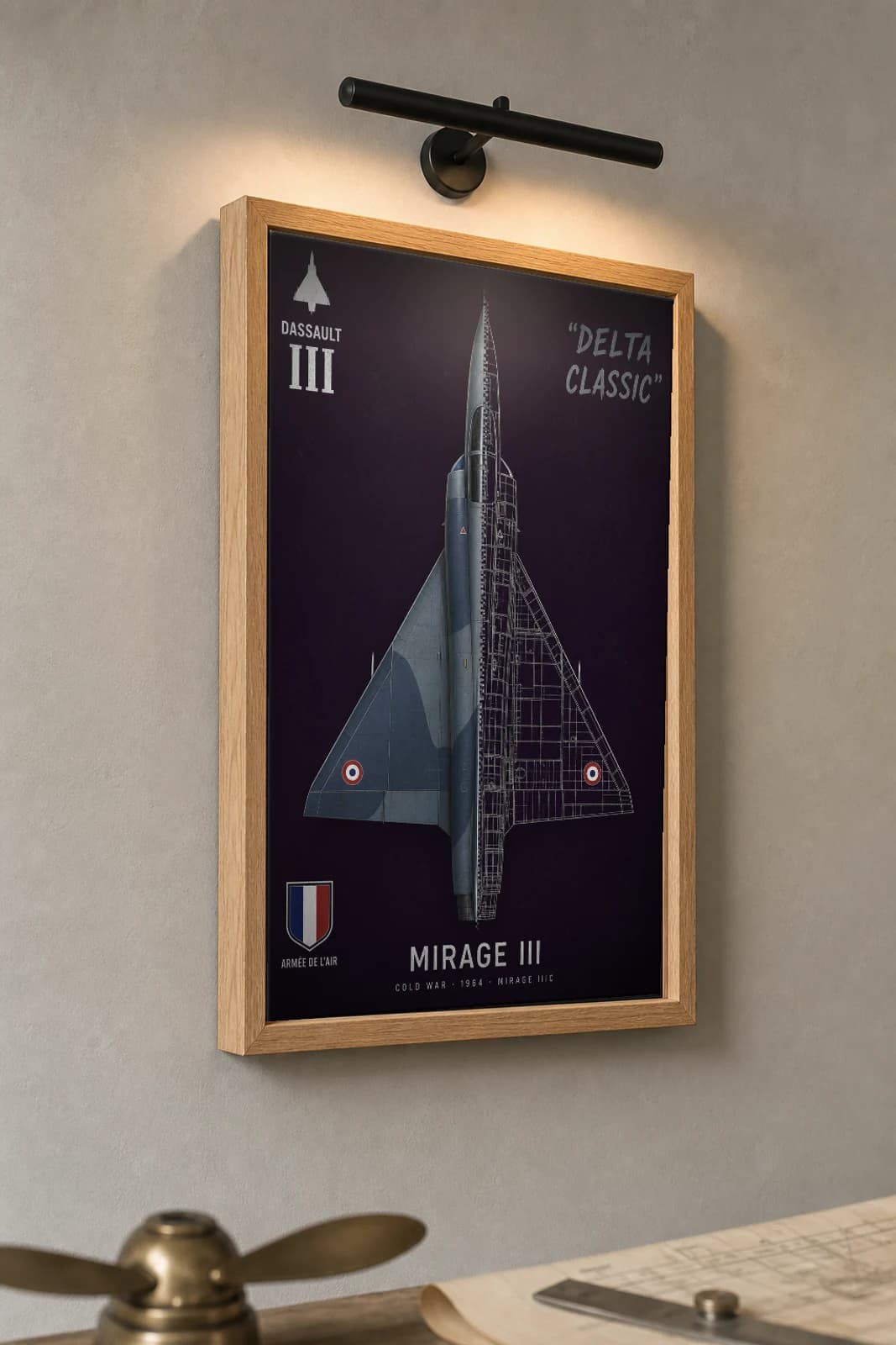 Mirage IIIC Cutaway Poster — 1964 Delta-Wing Interceptor Split-View Blueprint Print — the framed print shown at a three-quarter angle on a styled gallery wall in a natural-oak frame