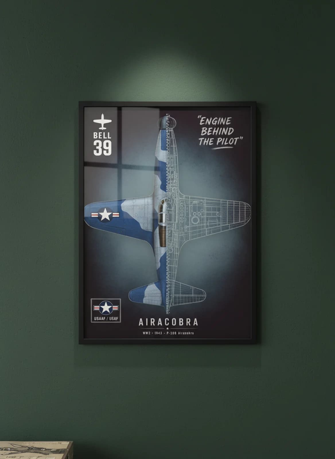P-39Q Airacobra — Aircraft Cutaway cutaway poster in black A2 frame on two-tone-blue-camouflage deep forest wall — Aircraft Cutaways enthusiast study mockup