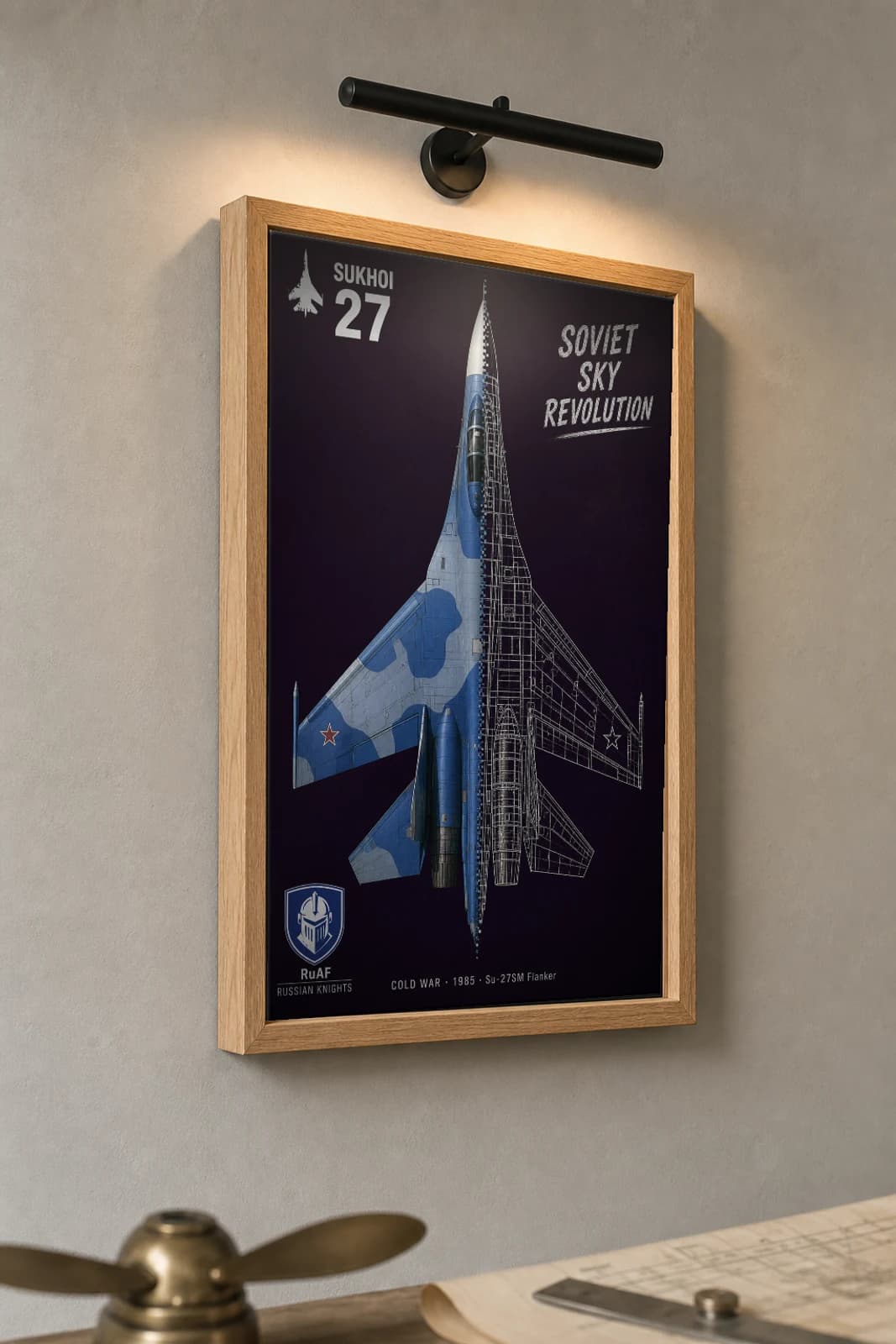 Su-27SM Flanker Cutaway Poster — Su-27SM Cold War Split-View Blueprint Print — the framed print shown at a three-quarter angle on a styled gallery wall in a natural-oak frame