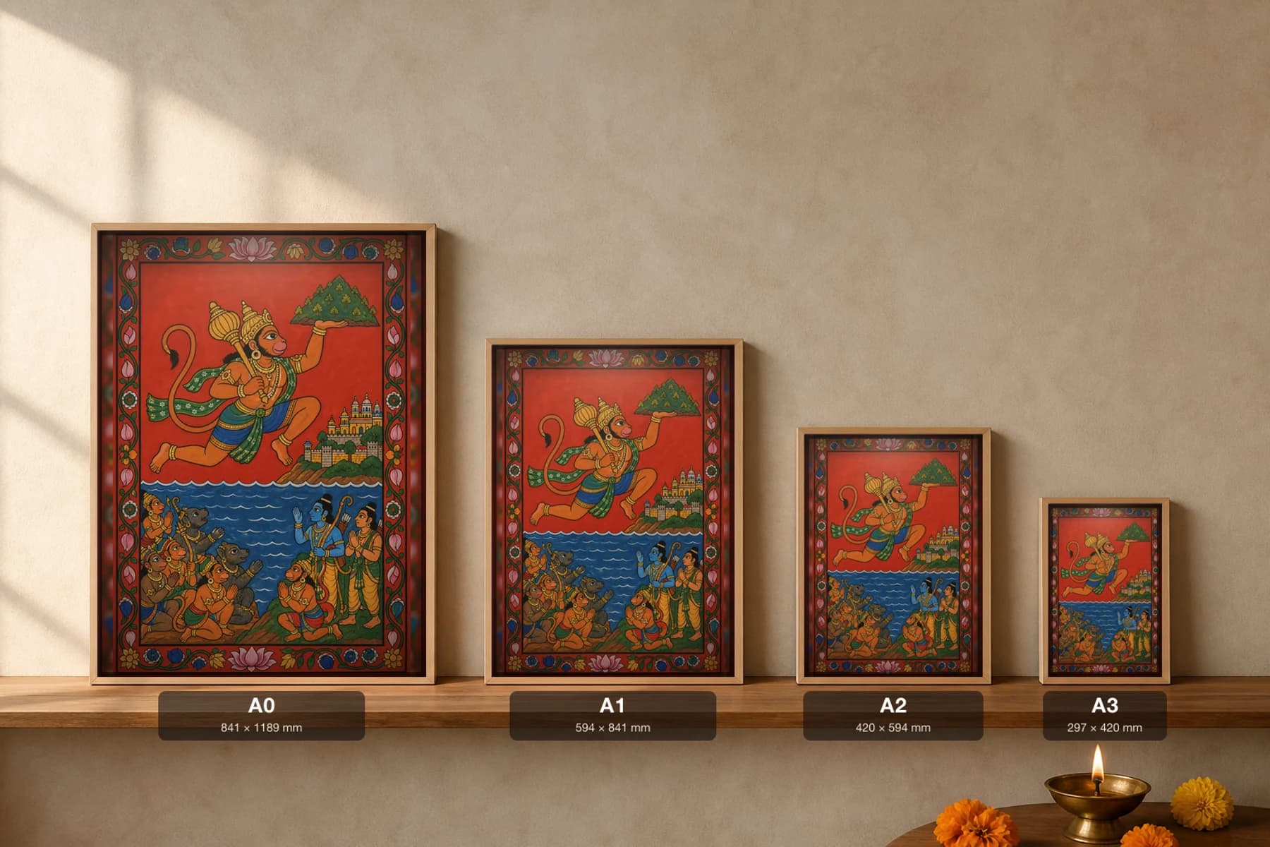 Hanuman Leap Cheriyal Scroll Print — Hanuman in Flight Over the Ocean to Lanka in Nakashi Folk Grammar on a Vermilion Ground — print size guide showing the artwork at A0, A1, A2 and A3 in natural-oak frames at true relative scale