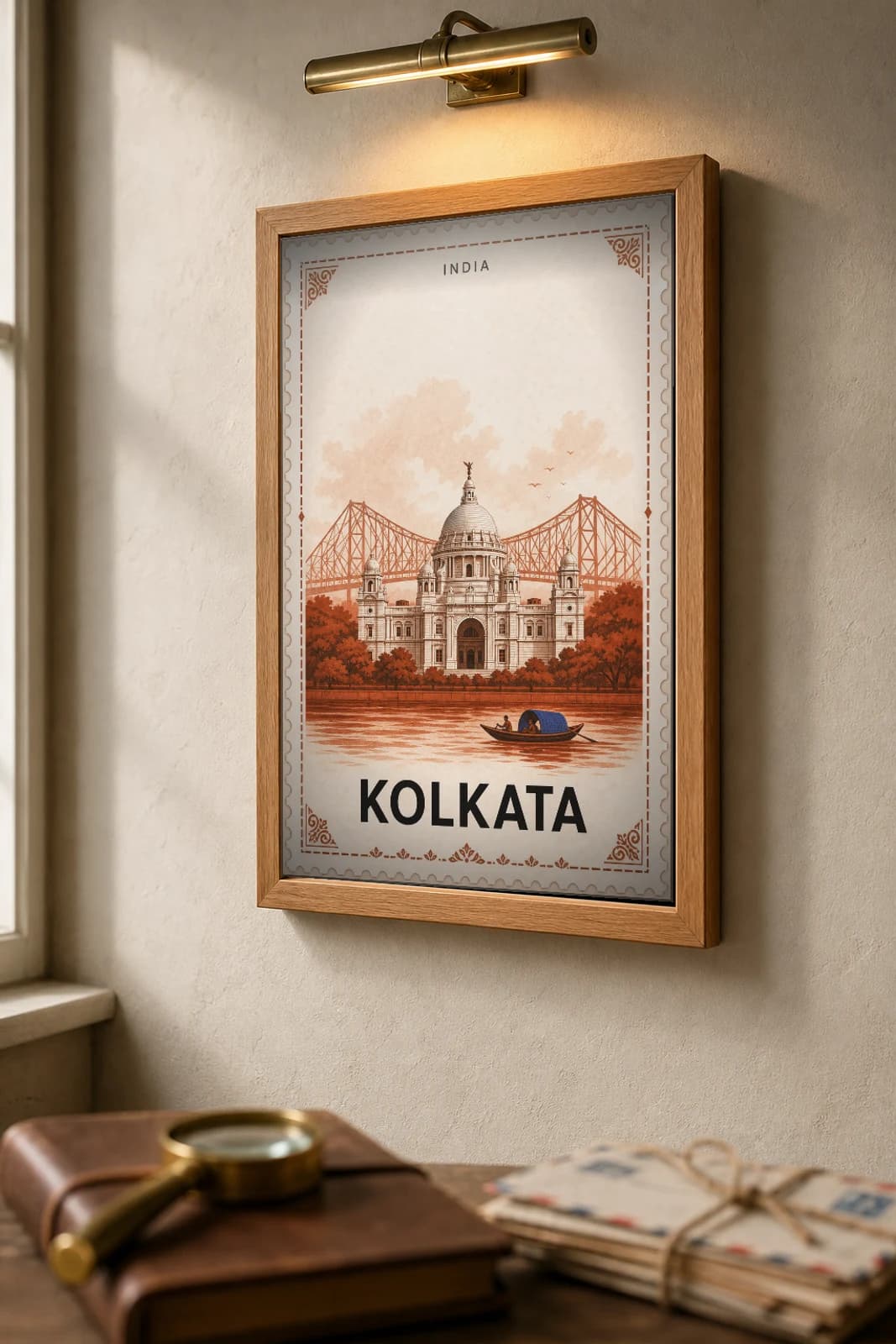 Kolkata City Stamp Poster — India travel wall art · illustrated stamp print · framed A2 — the framed print shown at a three-quarter angle on a styled gallery wall in a natural-oak frame