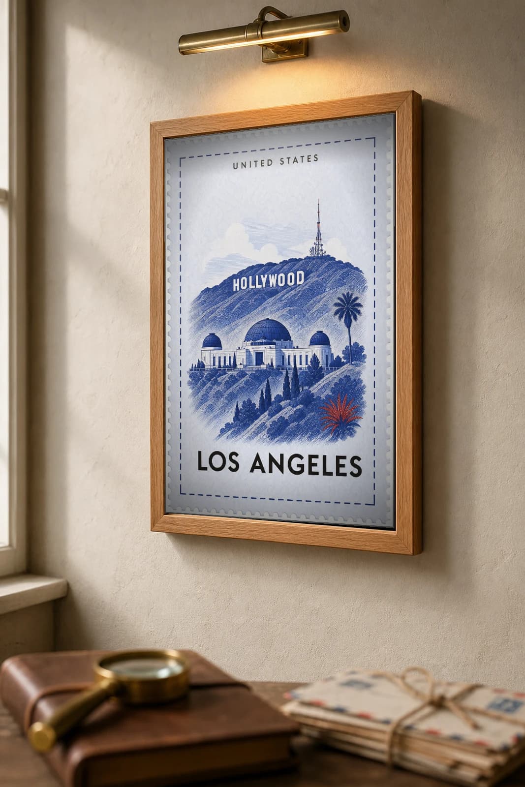 Los Angeles City Stamp Poster — United States travel wall art · illustrated stamp print · framed A2 — the framed print shown at a three-quarter angle on a styled gallery wall in a natural-oak frame
