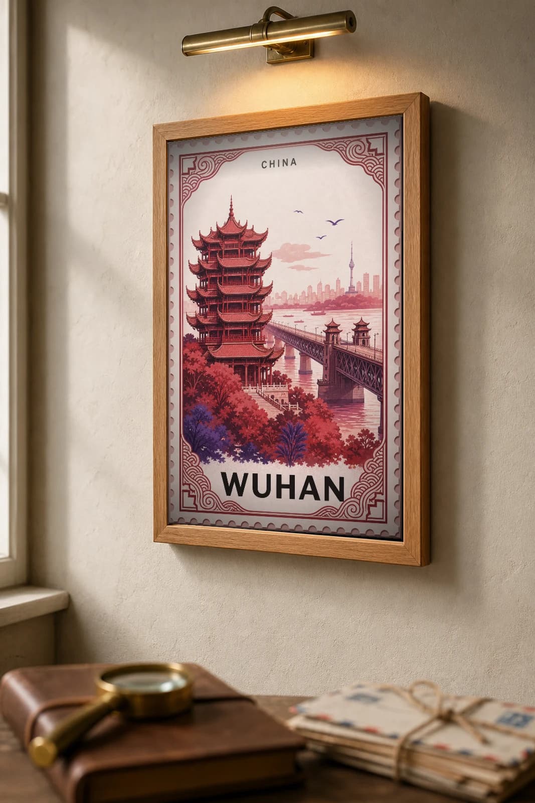 Wuhan City Stamp Poster — China travel wall art · illustrated stamp print · framed A2 — the framed print shown at a three-quarter angle on a styled gallery wall in a natural-oak frame