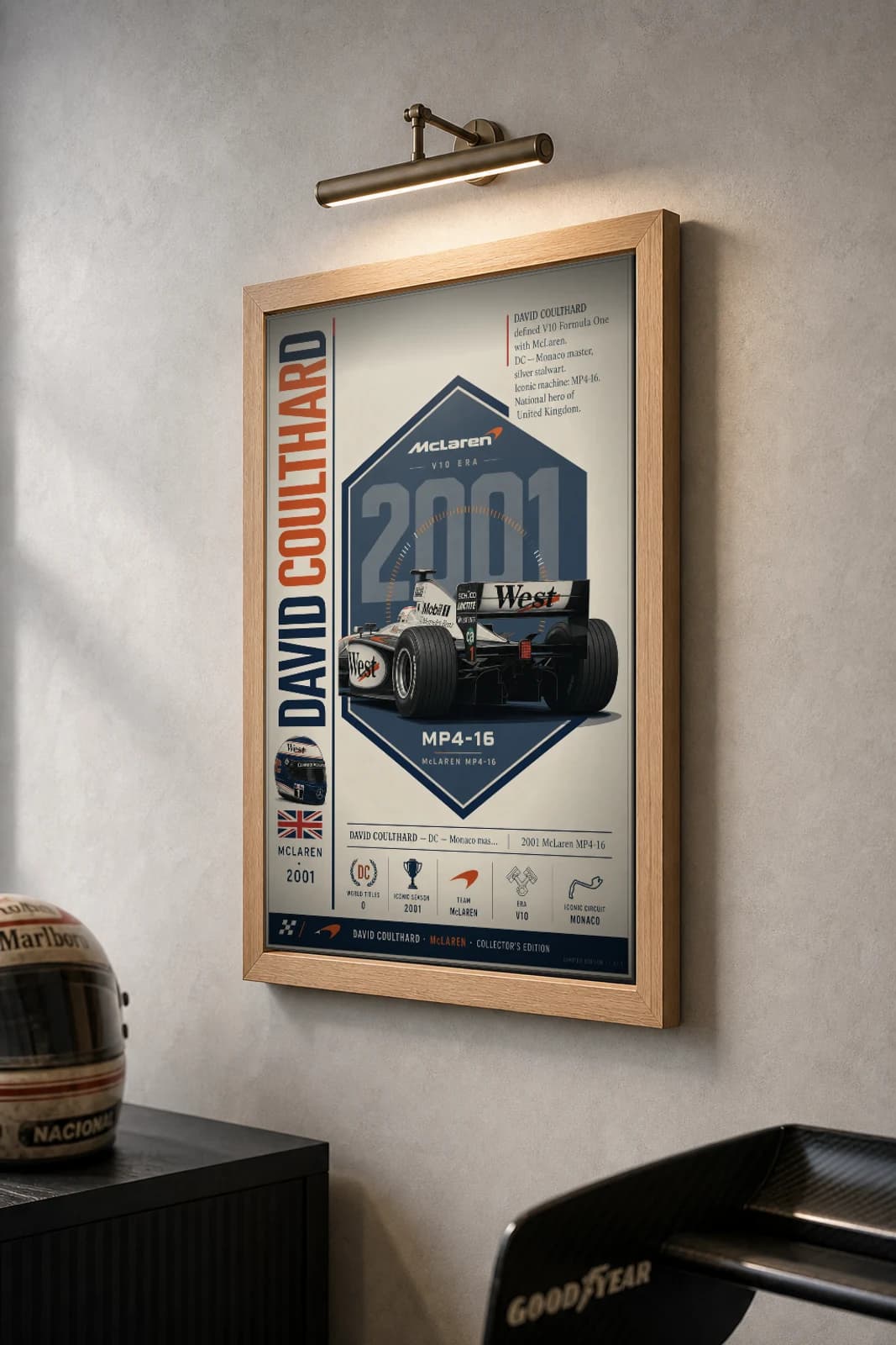 David Coulthard Poster — 2001 McLaren MP4-16 V10 F1 Heritage Collector Print — the framed print shown at a three-quarter angle on a styled gallery wall in a natural-oak frame