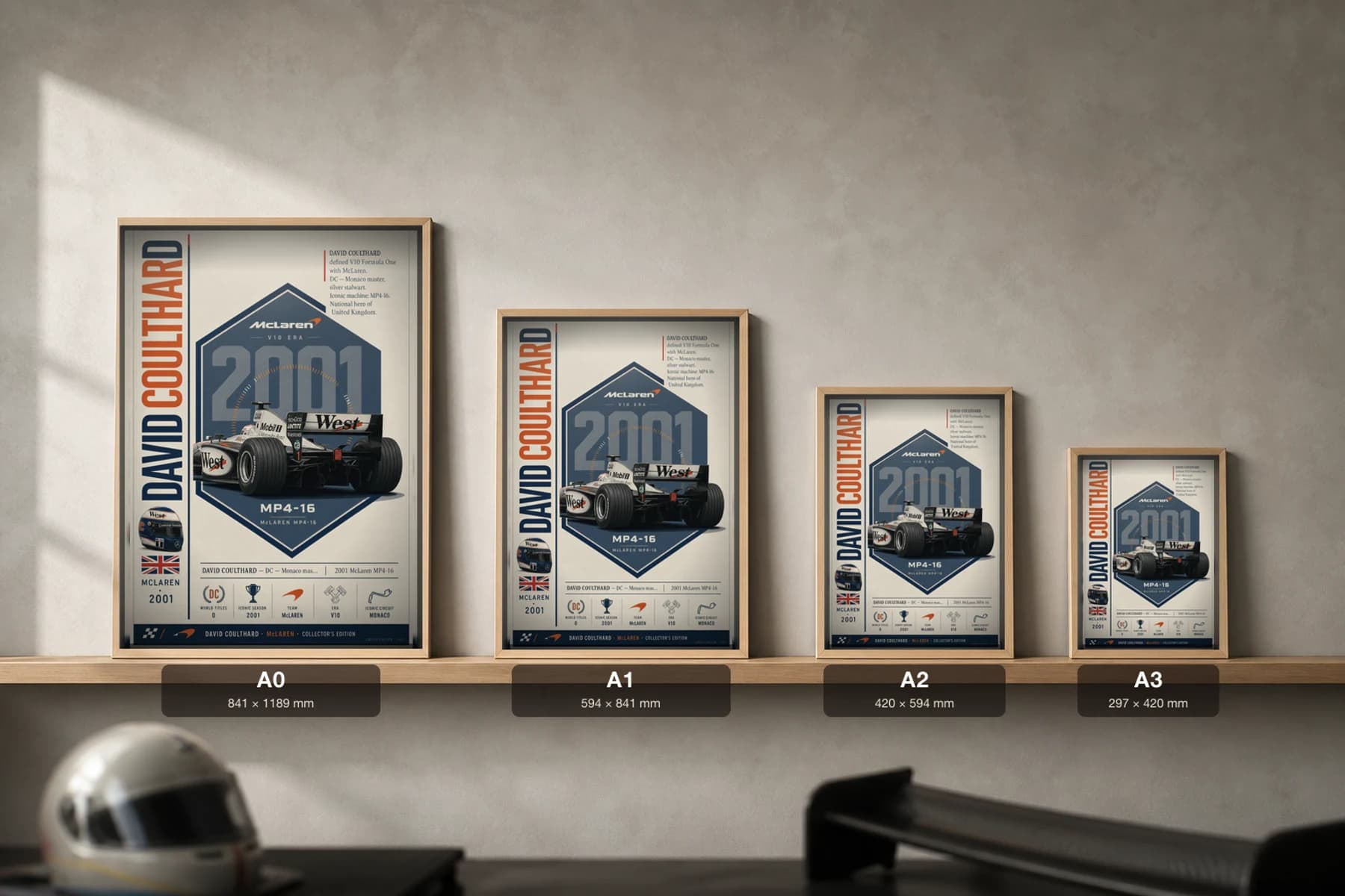 David Coulthard Poster — 2001 McLaren MP4-16 V10 F1 Heritage Collector Print — print size guide showing the artwork at A0, A1, A2 and A3 in natural-oak frames at true relative scale