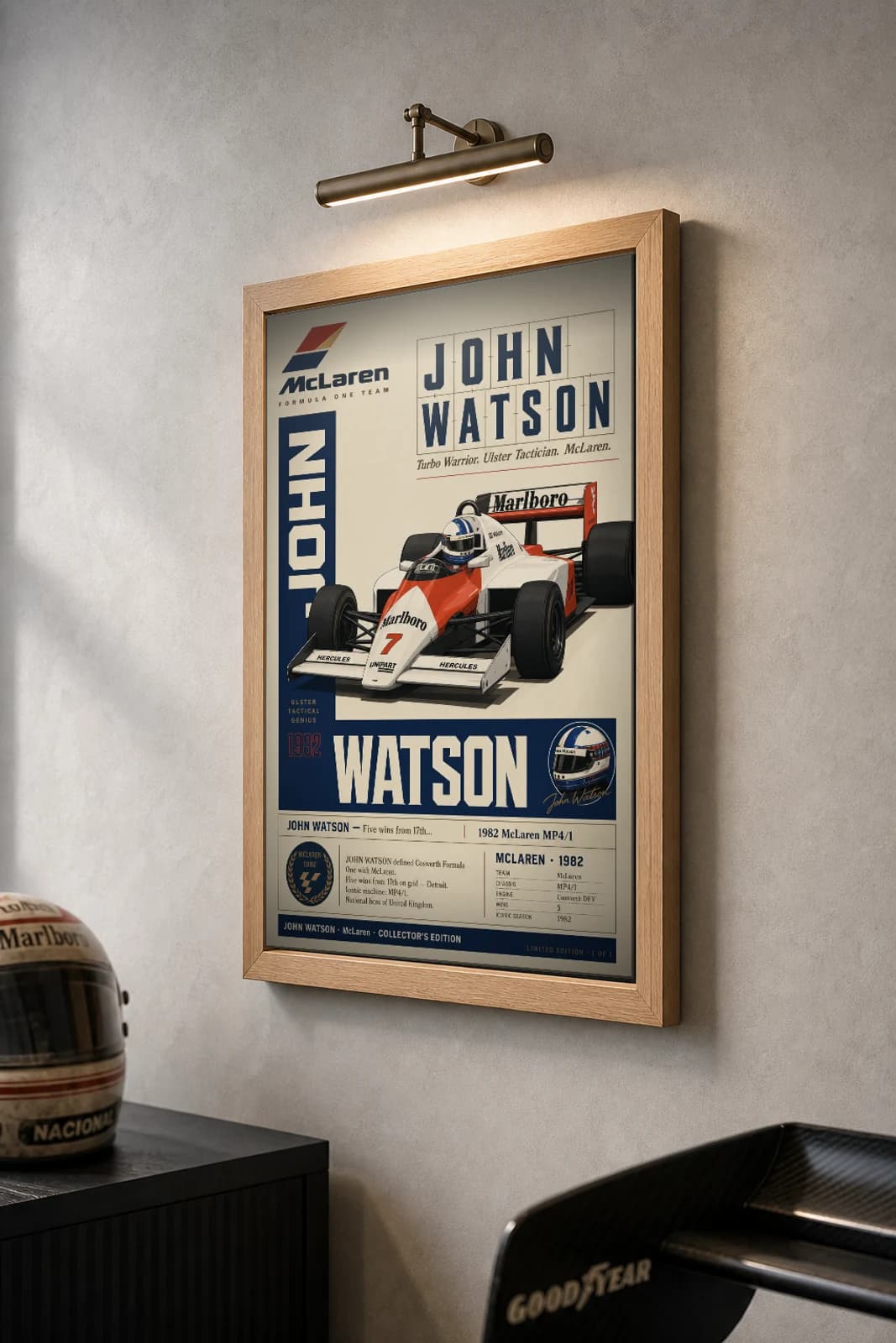 John Watson Poster — 1982 McLaren MP4/1 Cosworth F1 Heritage Collector Print — the framed print shown at a three-quarter angle on a styled gallery wall in a natural-oak frame