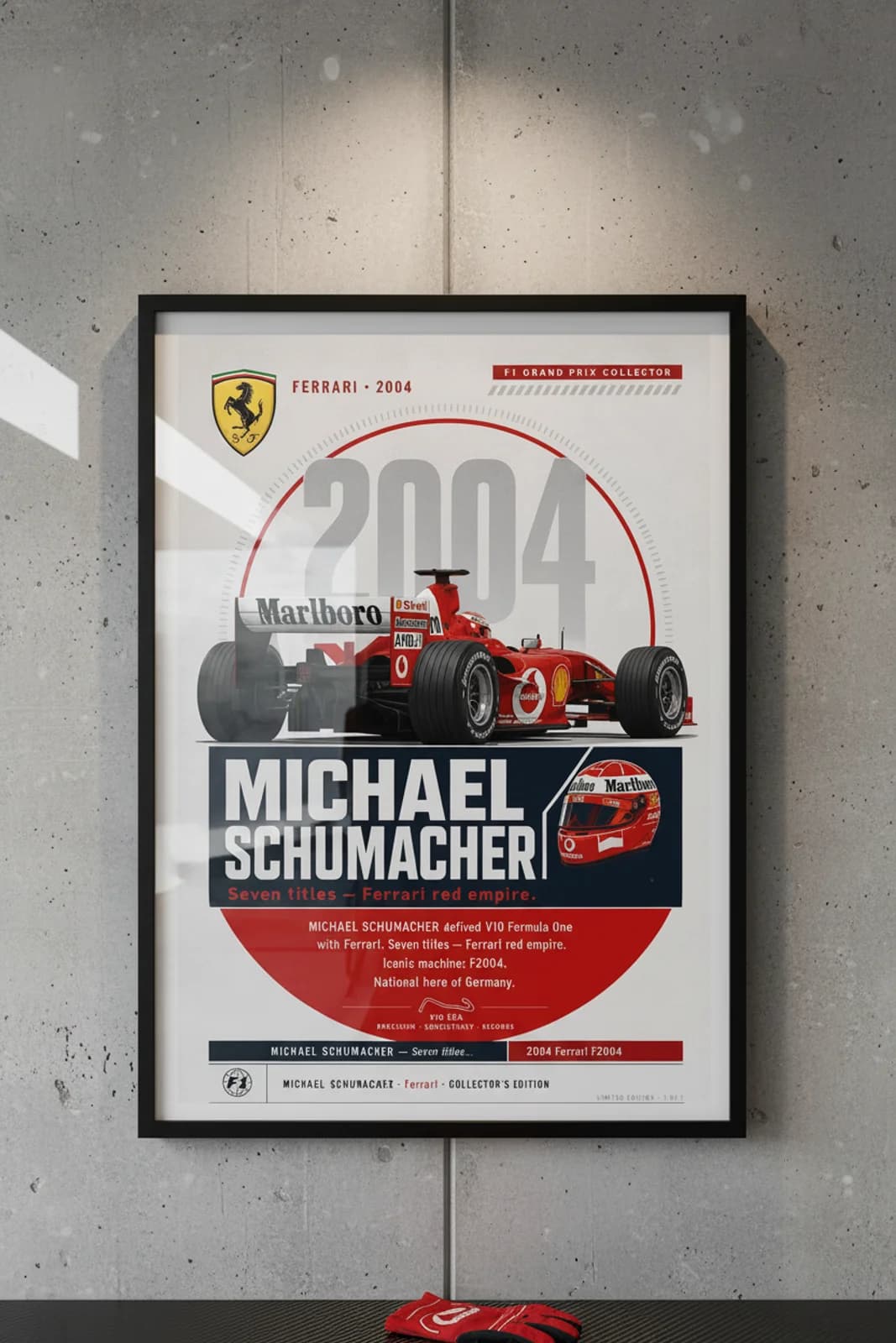 Michael Schumacher — F1 Heritage Collector poster in black A2 frame on ferrari-rosso-corsa polished concrete wall — F1 heritage collector mockup