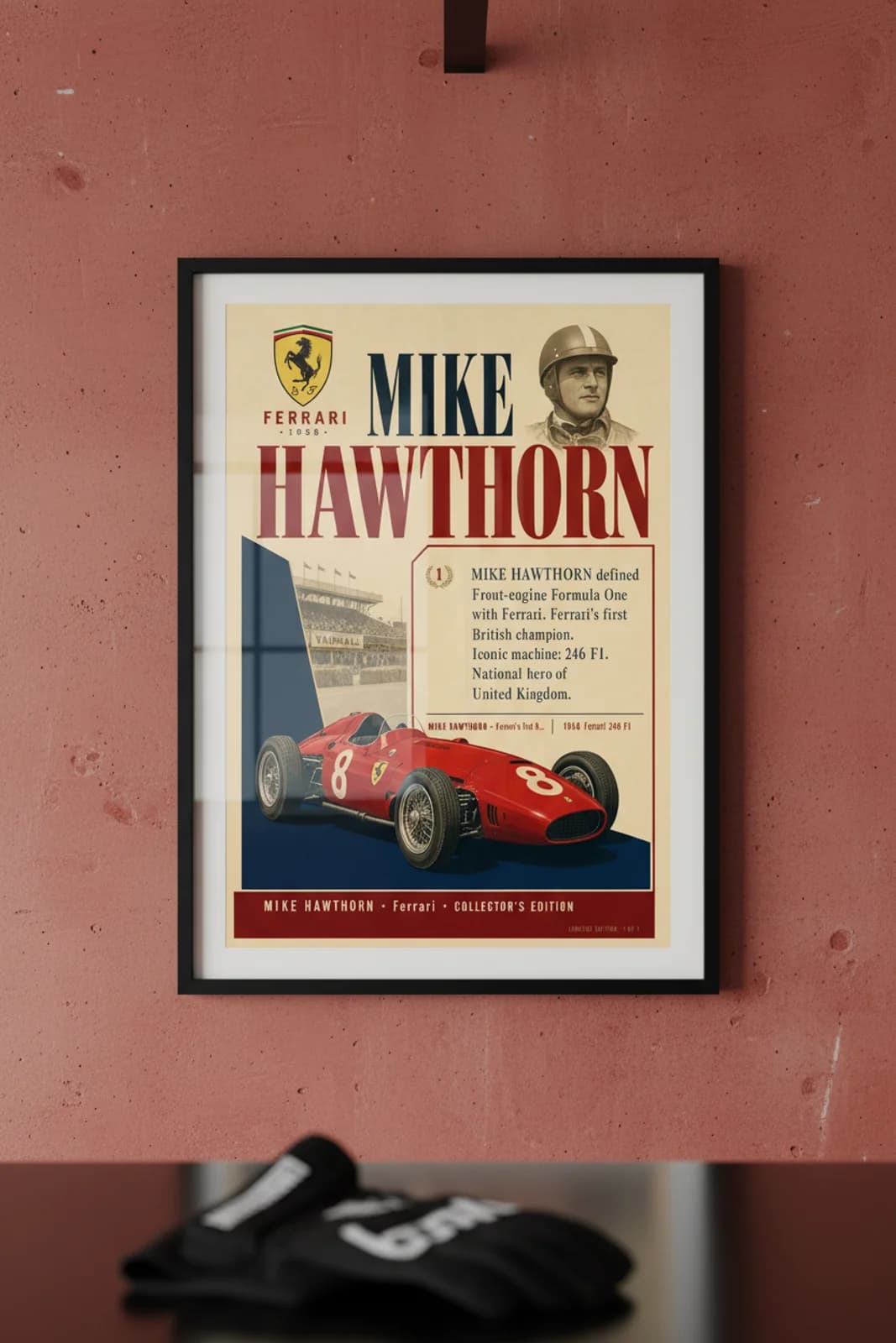 Mike Hawthorn poster in black A2 frame on ferrari-rosso-corsa polished concrete wall — F1 heritage collector mockup