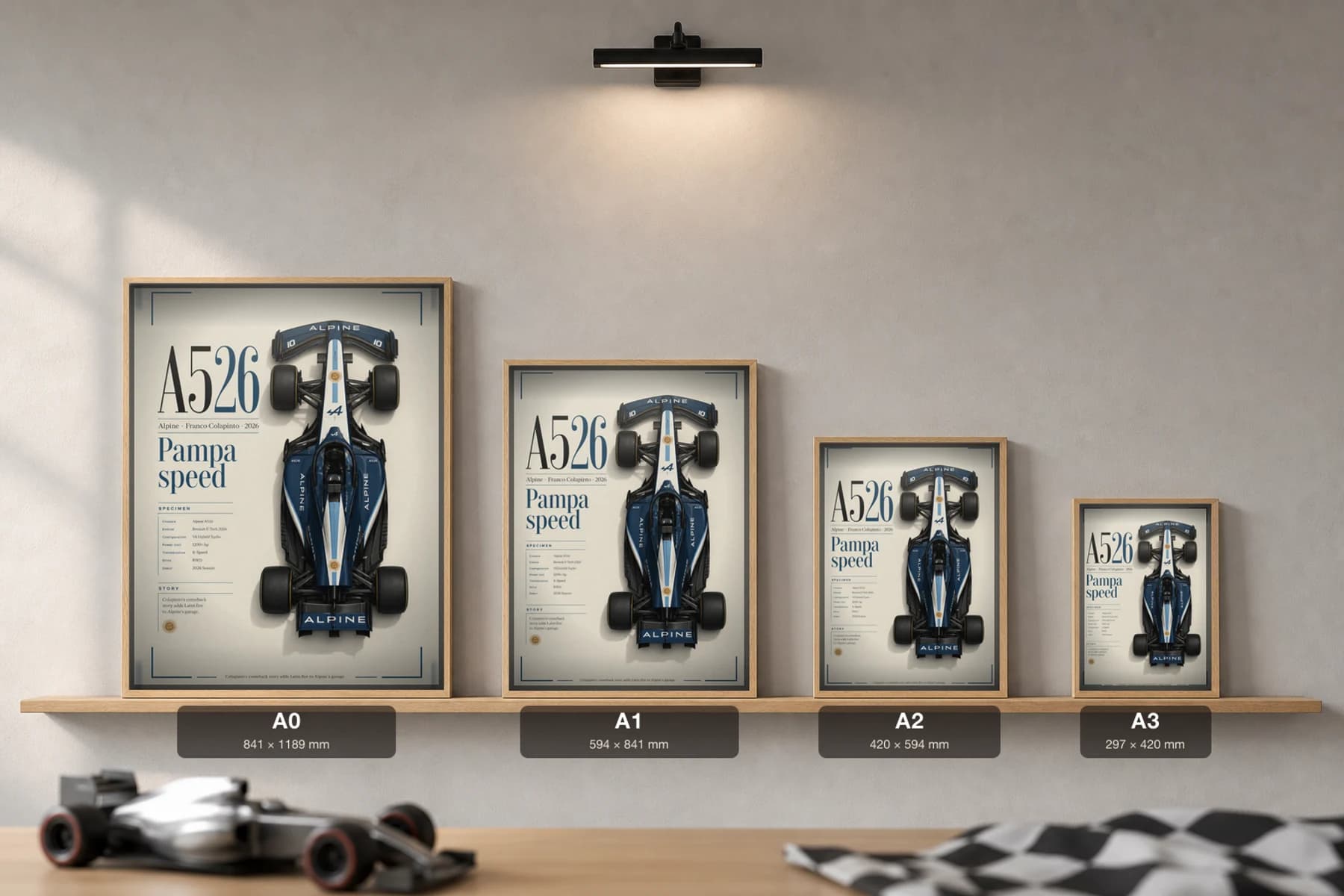 Alpine F1 Team A526 — Franco Colapinto Poster — undefined F1 Grid Editorial Wall Art · framed A2 — print size guide showing the artwork at A0, A1, A2 and A3 in natural-oak frames at true relative scale