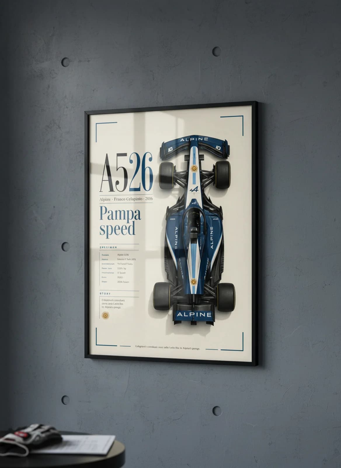 Franco Colapinto — A526 F1 Grid print in black A2 frame on alpine-blue editorial-slate wall — Formula 1 media room mockup