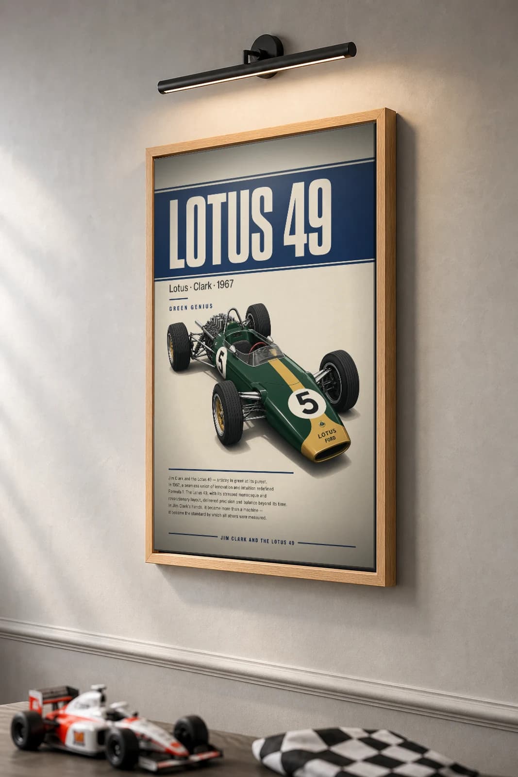 Jim Clark — Lotus 49 pioneer season Poster — 1967 F1 Grid Editorial Wall Art · framed A2 — the framed print shown at a three-quarter angle on a styled gallery wall in a natural-oak frame
