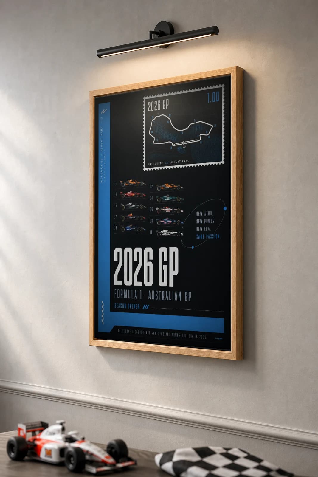 2026 Grid — 2026 Australian Grand Prix opener Poster — 2026 F1 Grid Editorial Wall Art · framed A2 — the framed print shown at a three-quarter angle on a styled gallery wall in a natural-oak frame