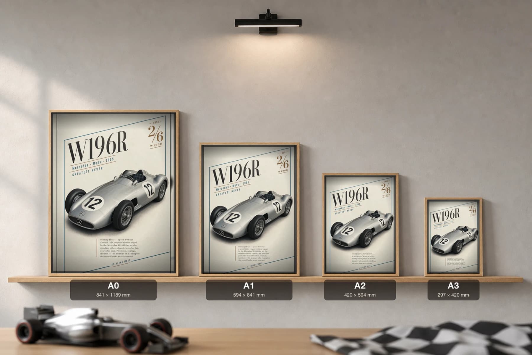 Stirling Moss — Moss Mercedes W196r Poster — Heritage F1 Grid Editorial Wall Art · framed A2 — print size guide showing the artwork at A0, A1, A2 and A3 in natural-oak frames at true relative scale