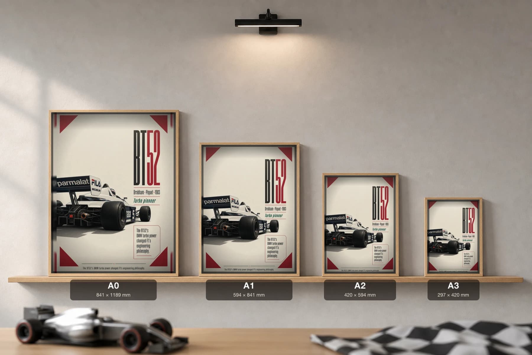 Nelson Piquet — Brabham BT52 turbo title Poster — 1983 F1 Grid Editorial Wall Art · framed A2 — print size guide showing the artwork at A0, A1, A2 and A3 in natural-oak frames at true relative scale