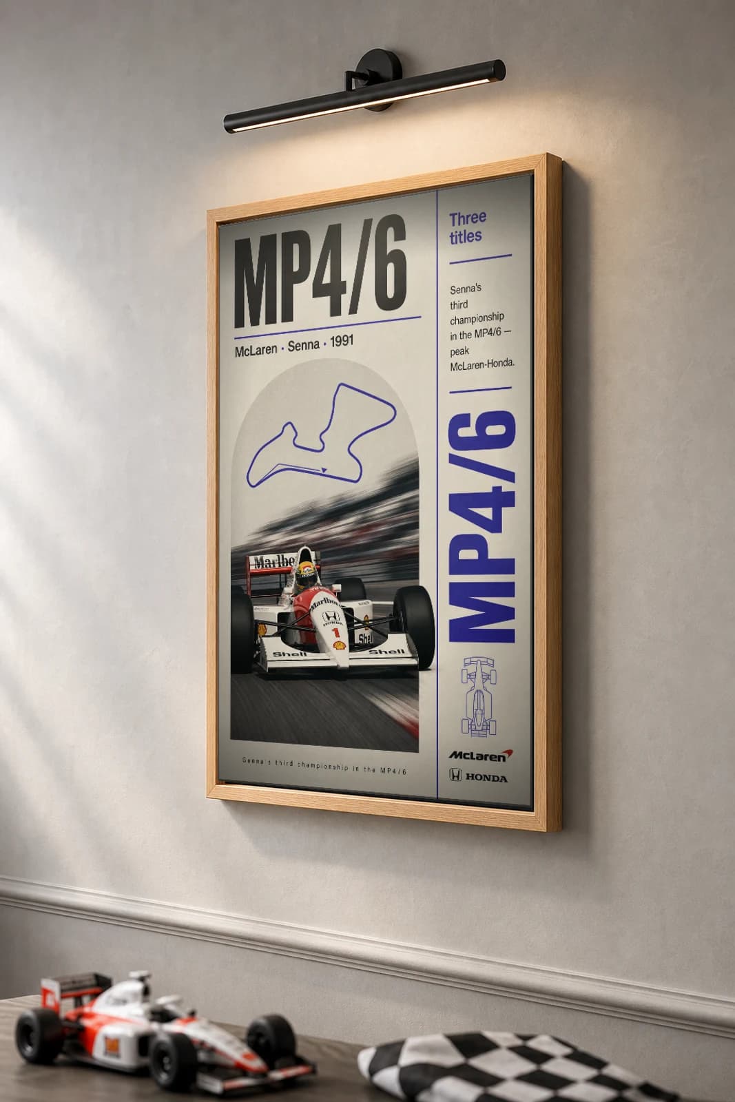 Ayrton Senna — 1991 McLaren-Honda dominance Poster — 1991 F1 Grid Editorial Wall Art · framed A2 — the framed print shown at a three-quarter angle on a styled gallery wall in a natural-oak frame