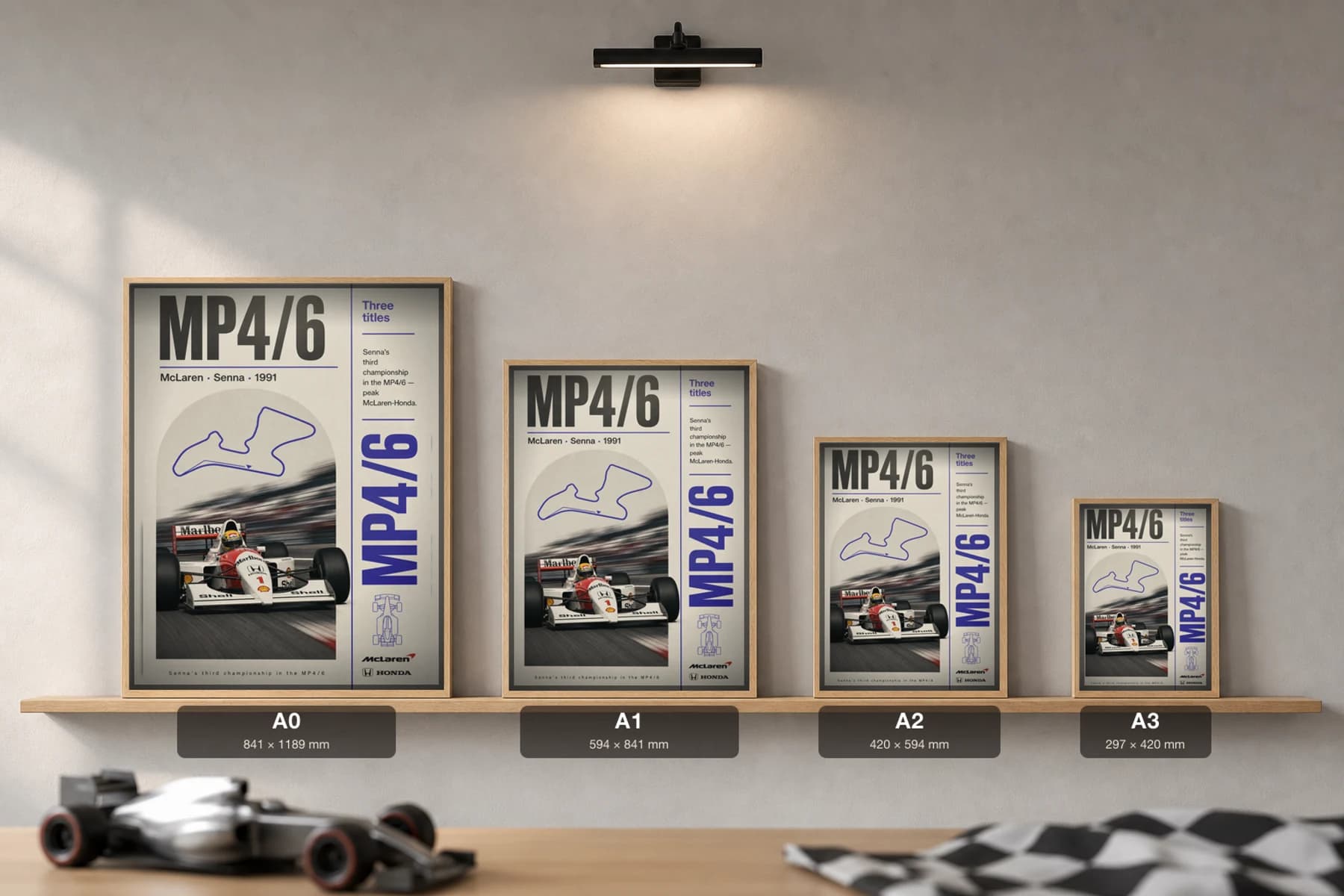 Ayrton Senna — 1991 McLaren-Honda dominance Poster — 1991 F1 Grid Editorial Wall Art · framed A2 — print size guide showing the artwork at A0, A1, A2 and A3 in natural-oak frames at true relative scale