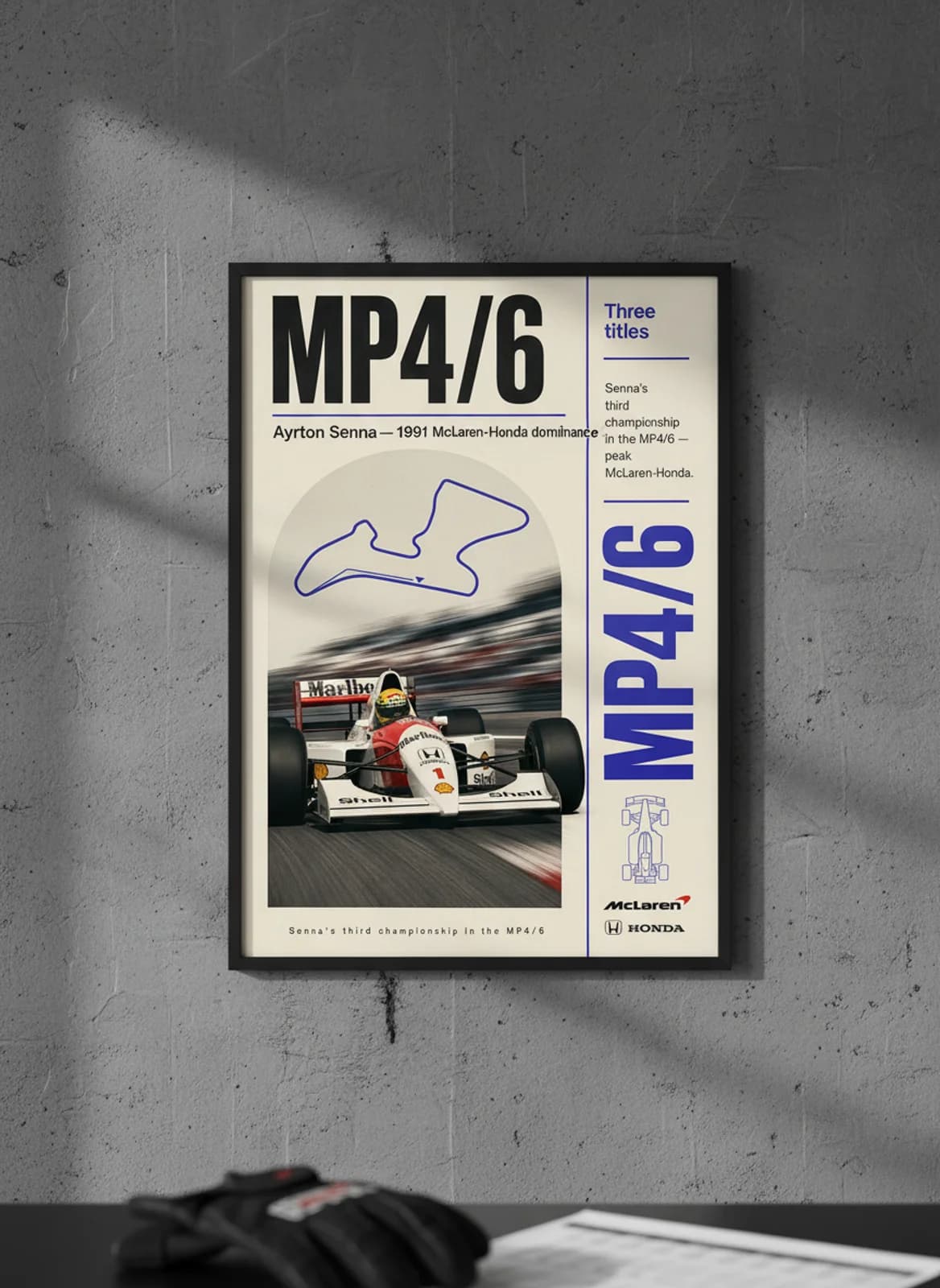 Ayrton Senna — 1991 McLaren-Honda dominance F1 Grid print in black A2 frame on gold-seal-accent editorial-slate wall — Formula 1 media room mockup