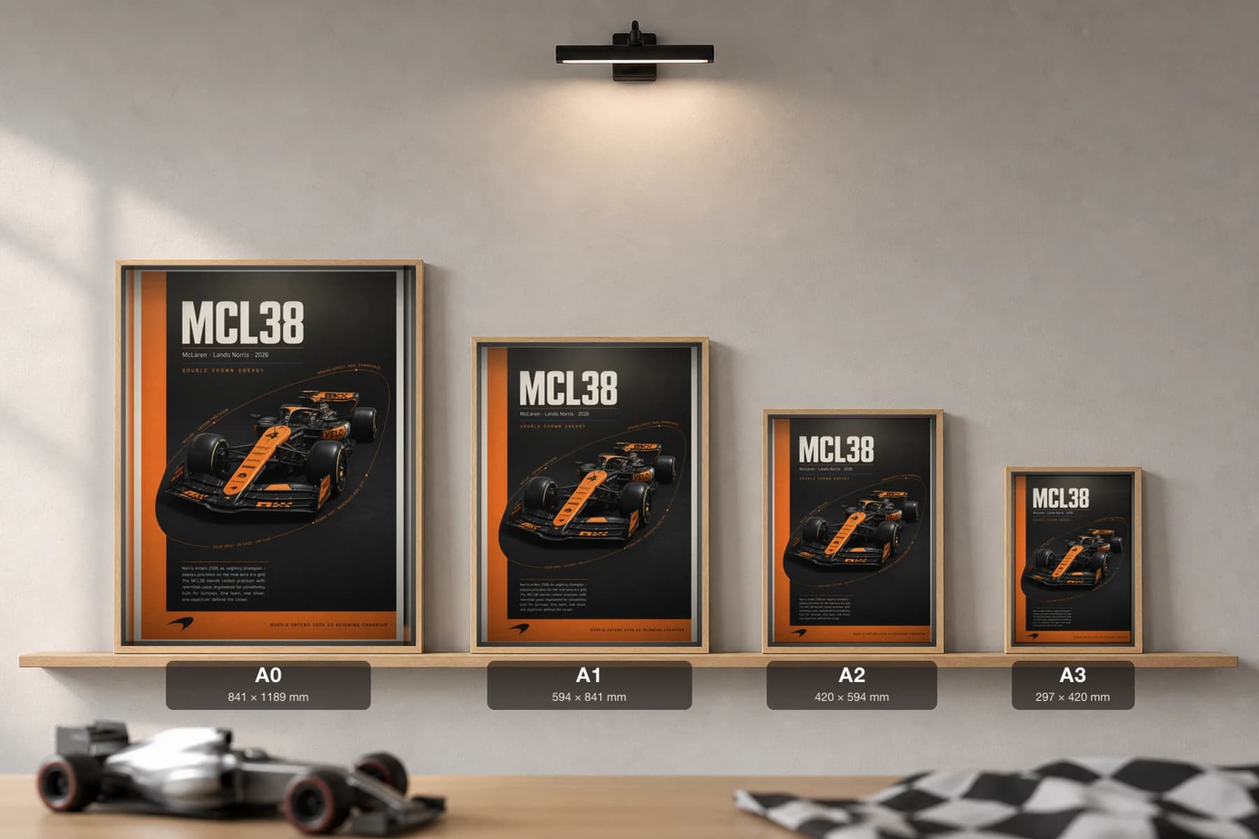 McLaren MCL38 — Lando Norris Poster — undefined F1 Grid Editorial Wall Art · framed A2 — print size guide showing the artwork at A0, A1, A2 and A3 in natural-oak frames at true relative scale