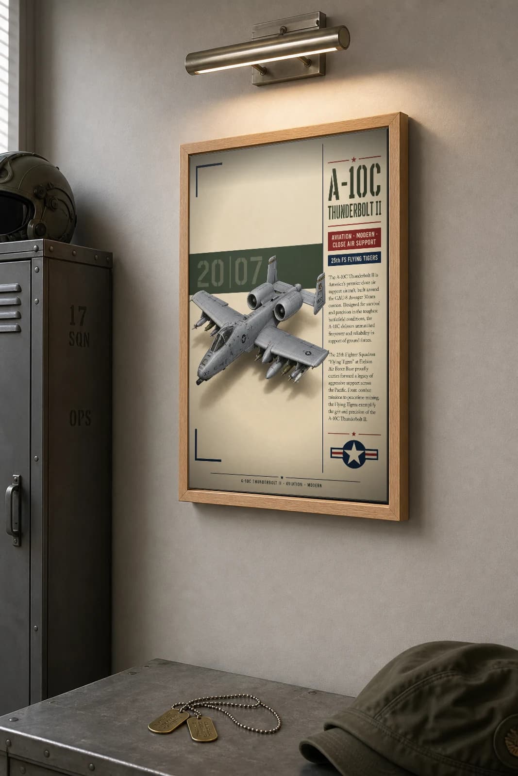A-10C Thunderbolt II Poster — 25th FS Flying Tigers military aviation wall art · framed A2 · 2007 — the framed print shown at a three-quarter angle on a styled gallery wall in a natural-oak frame