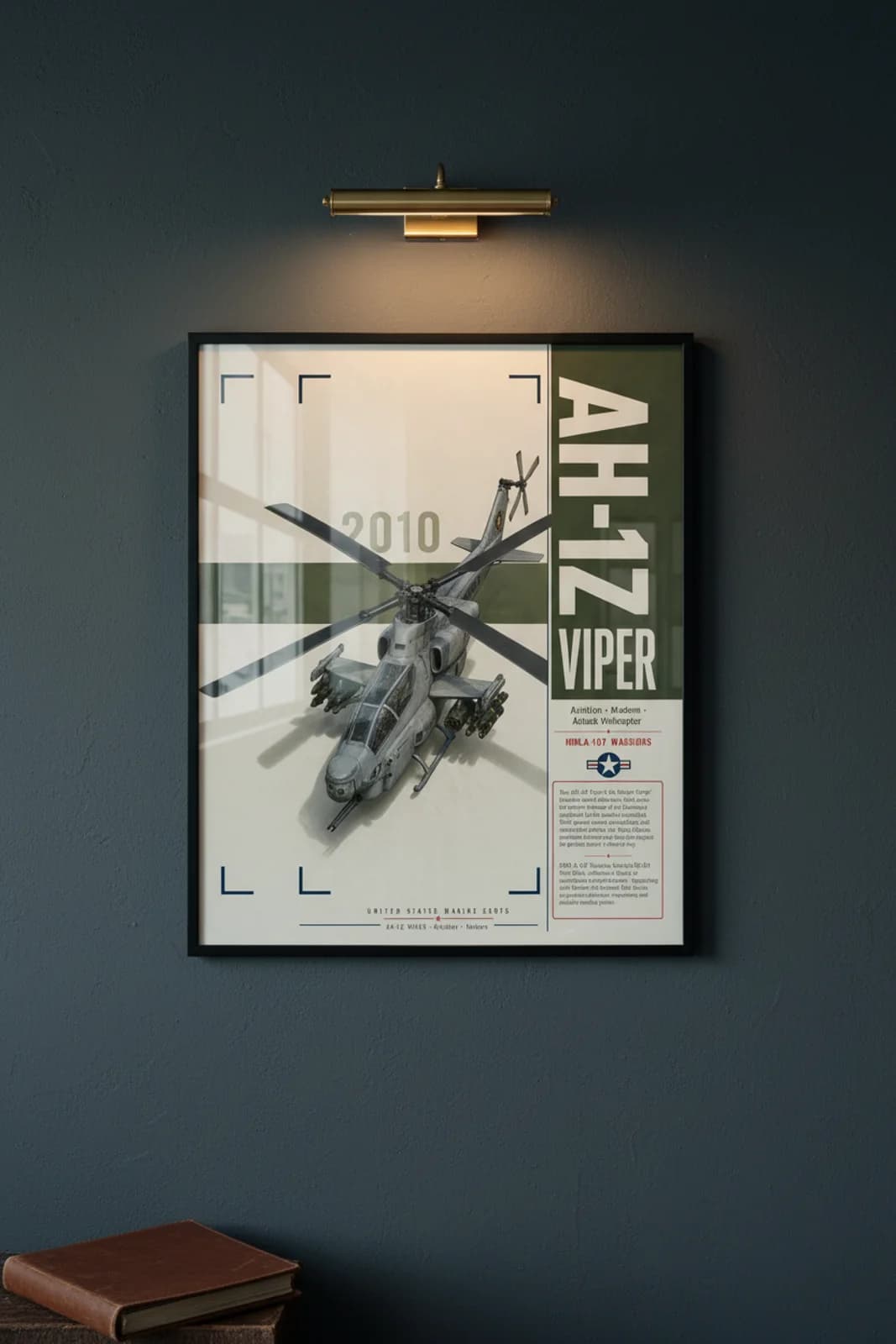 AH-1Z Viper aviation poster in black A2 frame on forest-green navy hangar wall — Aviation Heroes mockup