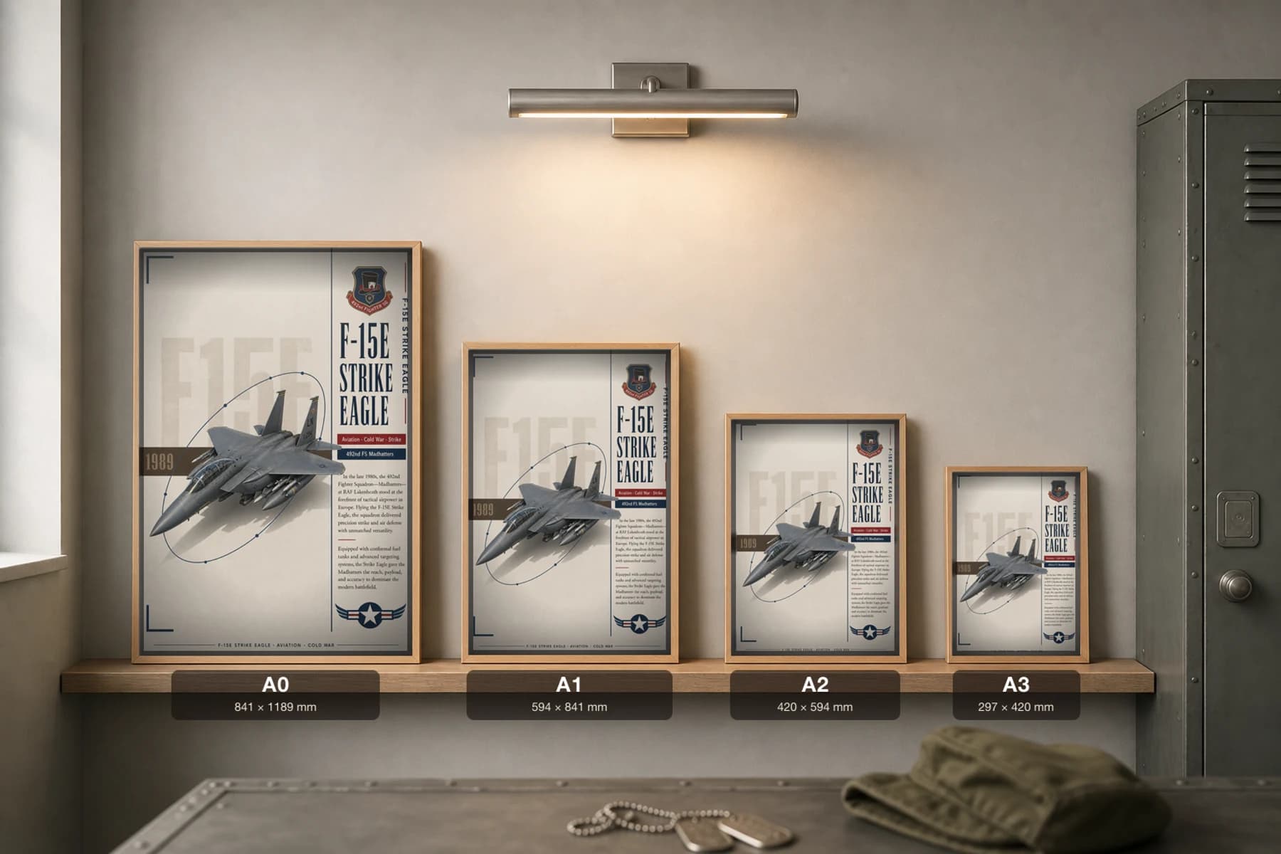 F-15E Strike Eagle Poster — 492nd FS Madhatters military aviation wall art · framed A2 · 1989 — print size guide showing the artwork at A0, A1, A2 and A3 in natural-oak frames at true relative scale