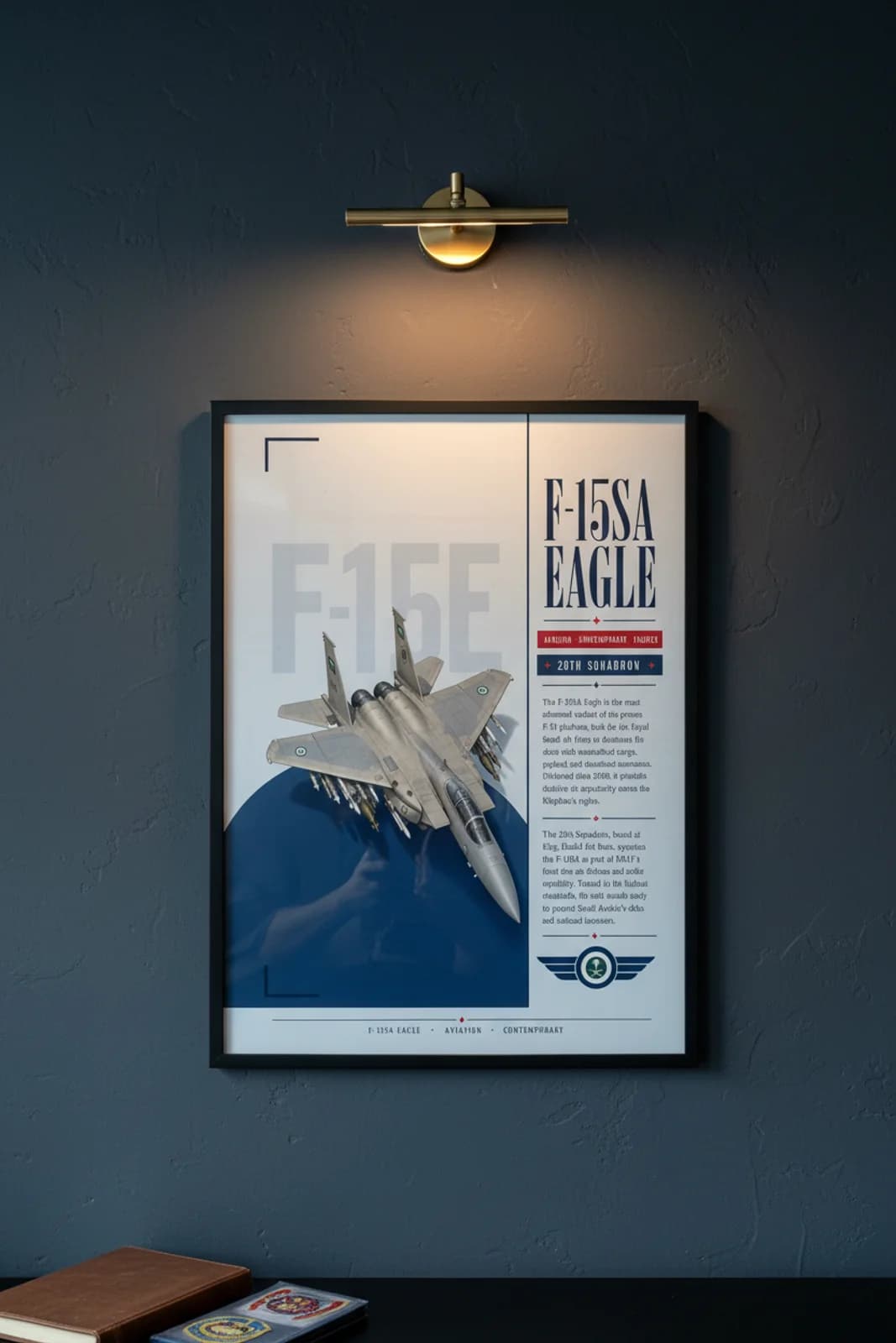 F-15SA Eagle aviation poster in black A2 frame on military-grey navy hangar wall — Aviation Heroes mockup