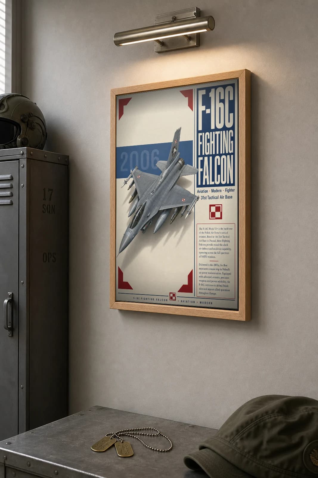 F-16 Fighting Falcon Poster — 31st Tactical Air Base military aviation wall art · framed A2 · 2006 — the framed print shown at a three-quarter angle on a styled gallery wall in a natural-oak frame