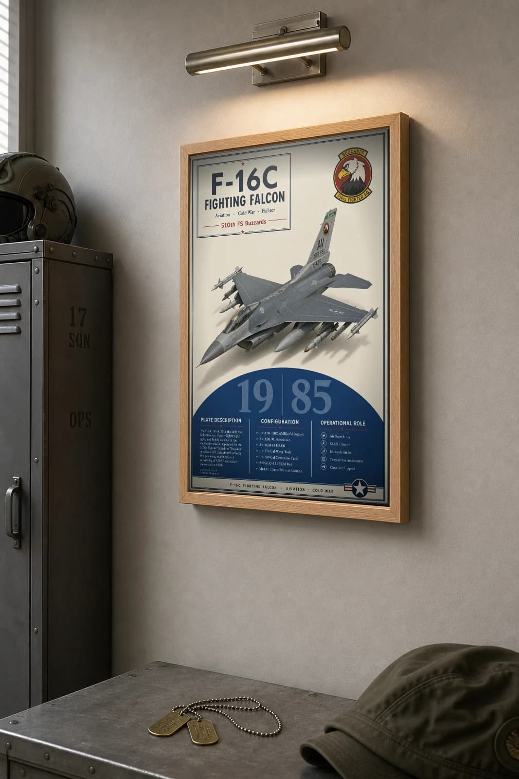 F-16C Fighting Falcon Poster — 510th FS Buzzards military aviation wall art · framed A2 · 1985 — the framed print shown at a three-quarter angle on a styled gallery wall in a natural-oak frame