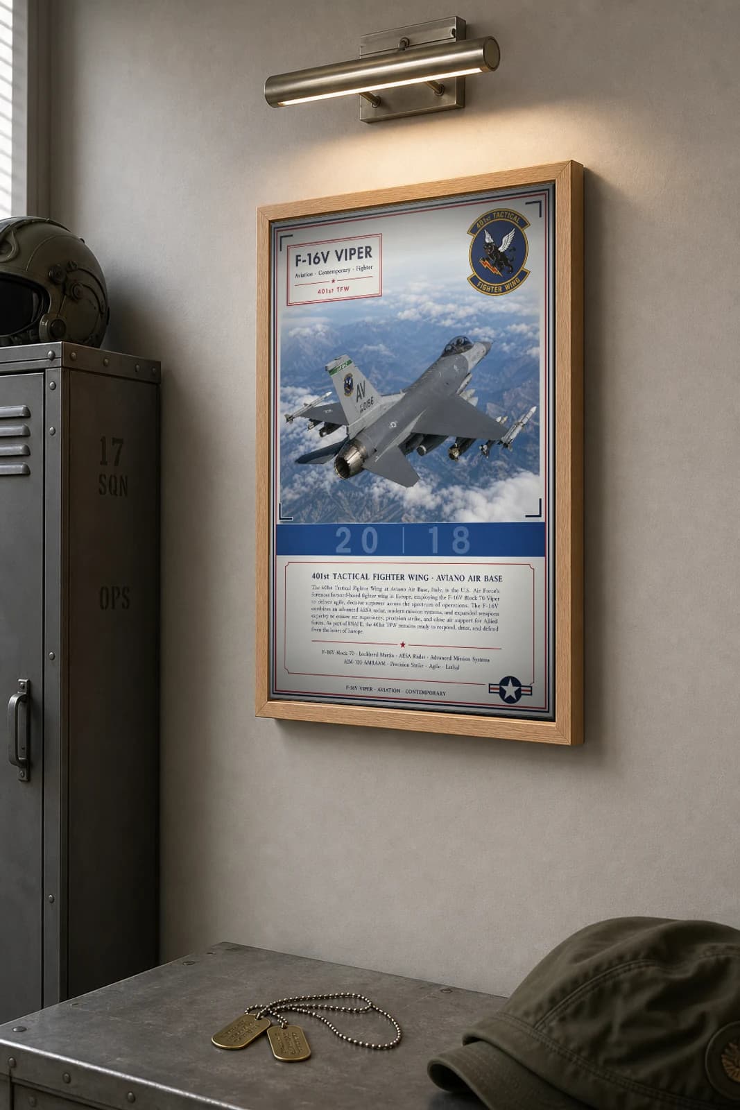 F-16V VIPER Poster — 401st TFW military aviation wall art · framed A2 · 2018 — the framed print shown at a three-quarter angle on a styled gallery wall in a natural-oak frame