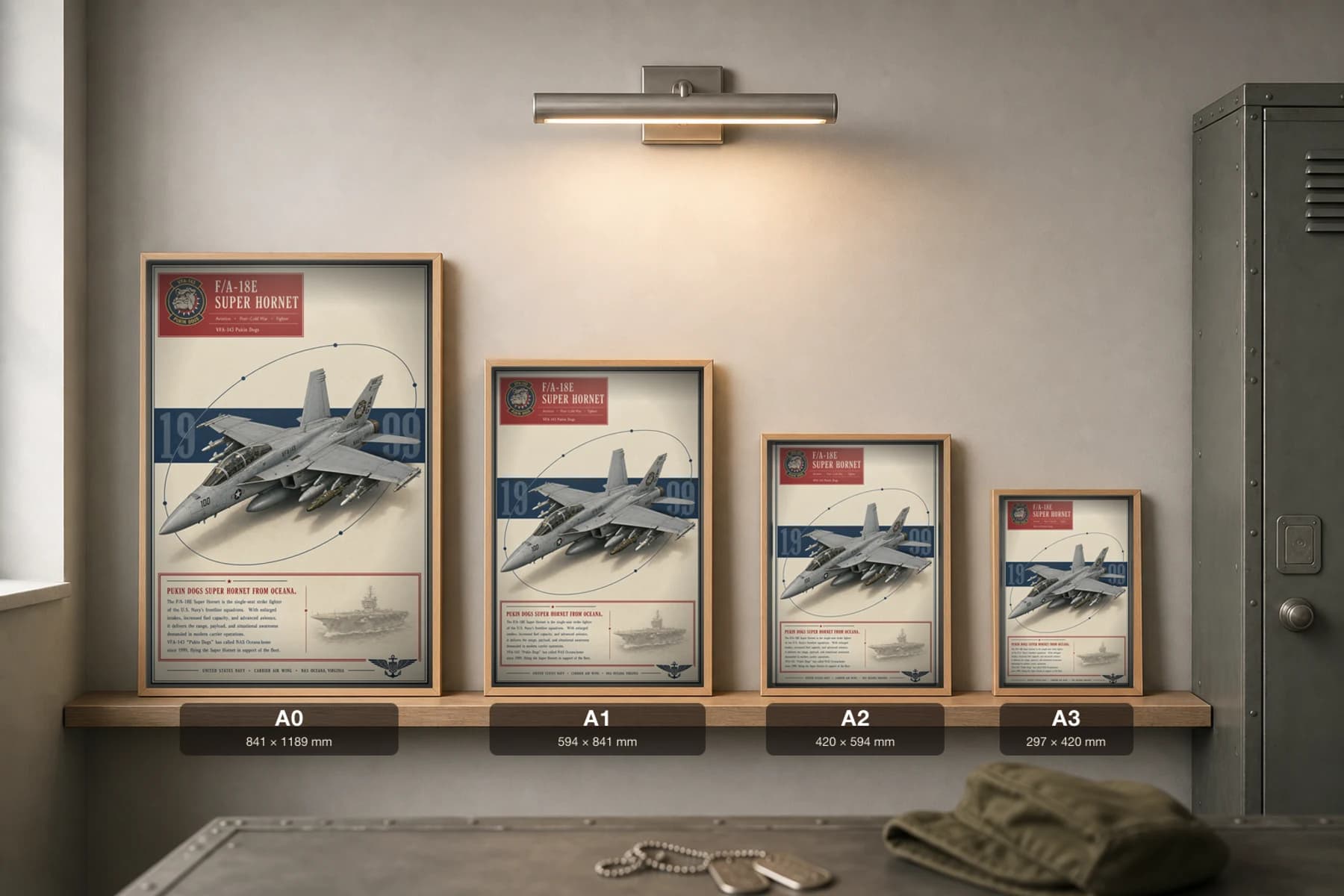 F/A-18E Super Hornet Poster — VFA-143 Pukin Dogs military aviation wall art · framed A2 · 1999 — print size guide showing the artwork at A0, A1, A2 and A3 in natural-oak frames at true relative scale