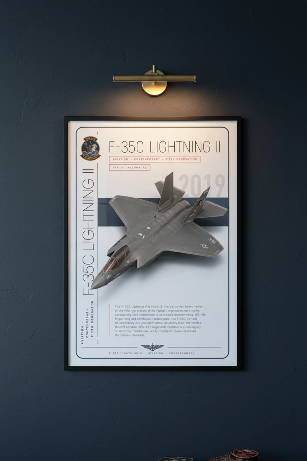 F-35C Lightning II aviation poster in black A2 frame on stealth-grey navy hangar wall — Aviation Heroes mockup