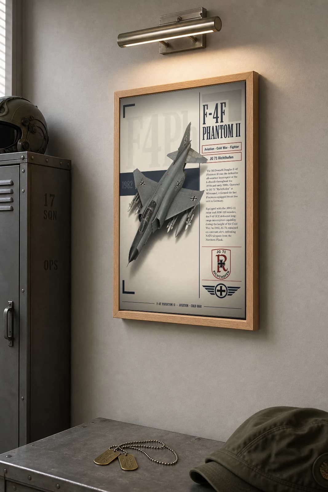 F-4F Phantom II Poster — JG 71 Richthofen military aviation wall art · framed A2 · 1982 — the framed print shown at a three-quarter angle on a styled gallery wall in a natural-oak frame