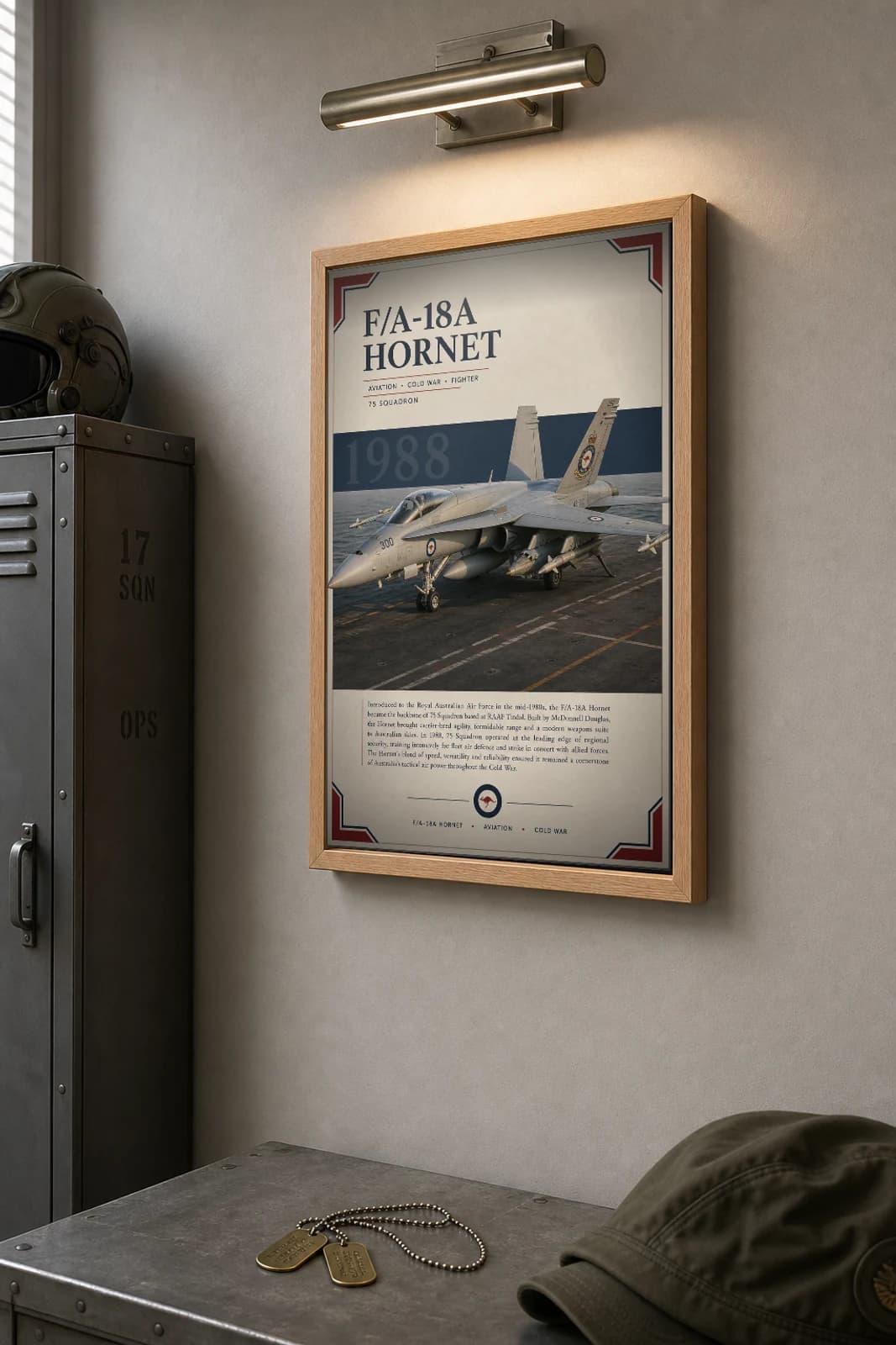F/A-18A Hornet Poster — 75 Squadron Magpies military aviation wall art · framed A2 · 1988 — the framed print shown at a three-quarter angle on a styled gallery wall in a natural-oak frame