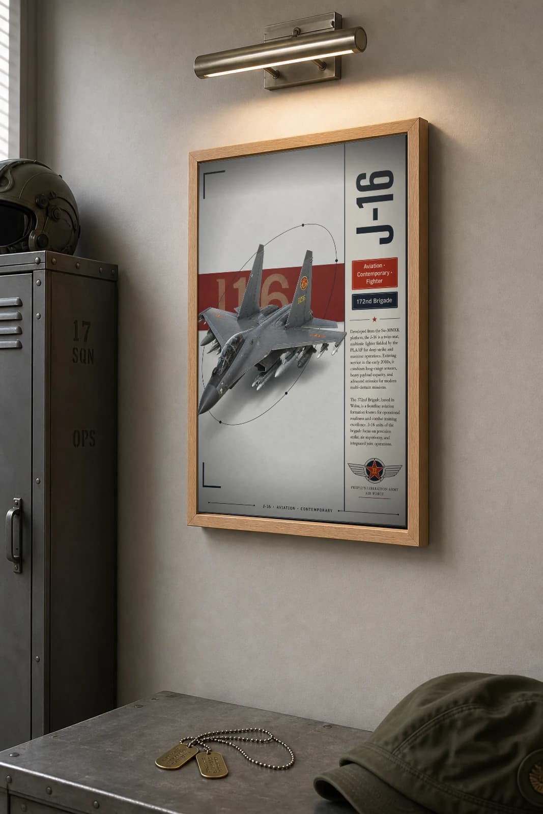 J-16 Poster — 172nd Brigade military aviation wall art · framed A2 · 2015 — the framed print shown at a three-quarter angle on a styled gallery wall in a natural-oak frame