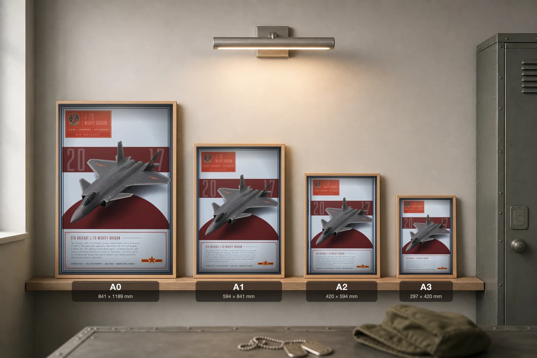 J-20 Mighty Dragon Poster — 9th Brigade military aviation wall art · framed A2 · 2017 — print size guide showing the artwork at A0, A1, A2 and A3 in natural-oak frames at true relative scale