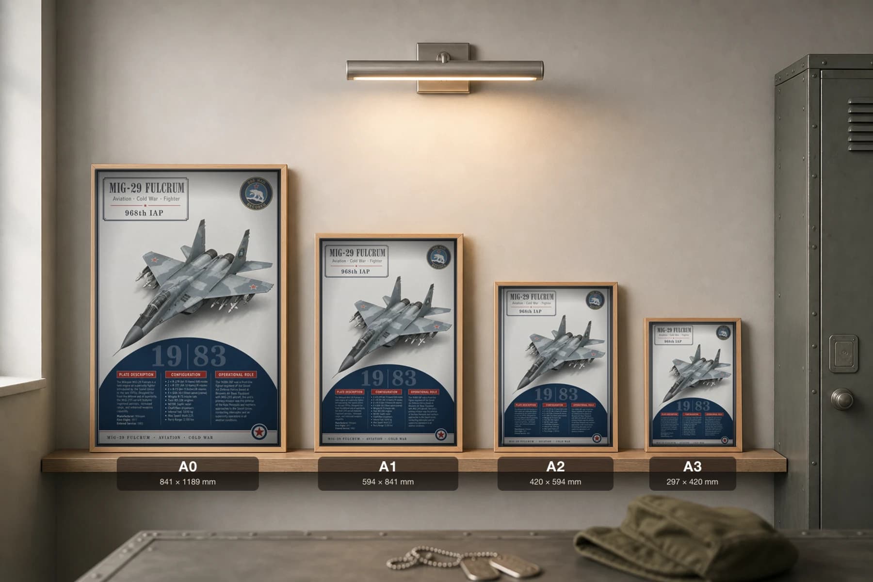MiG-29 Fulcrum Poster — 968th IAP military aviation wall art · framed A2 · 1983 — print size guide showing the artwork at A0, A1, A2 and A3 in natural-oak frames at true relative scale