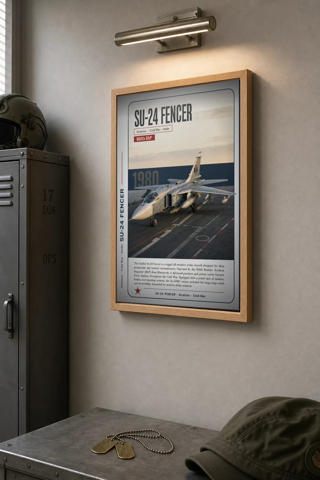Su-24 Fencer Poster — 968th BAP military aviation wall art · framed A2 · 1980 — the framed print shown at a three-quarter angle on a styled gallery wall in a natural-oak frame