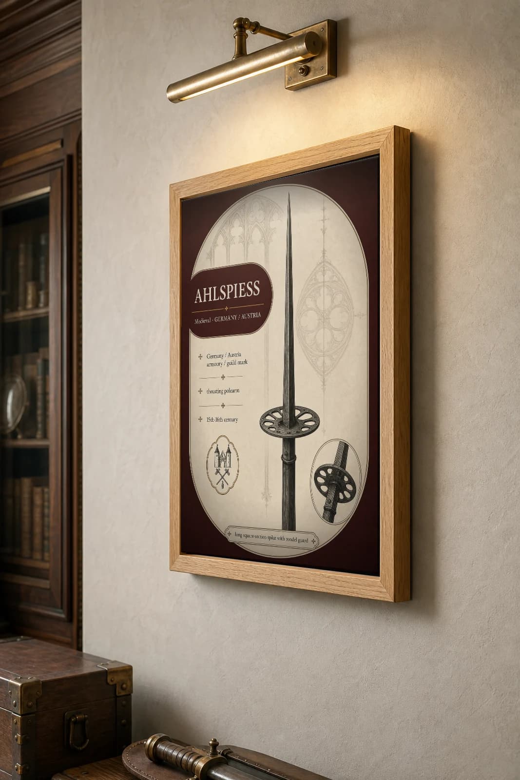 Ahlspiess Poster — Medieval Armoury Specimen Print · framed A2 — the framed print shown at a three-quarter angle on a styled gallery wall in a natural-oak frame