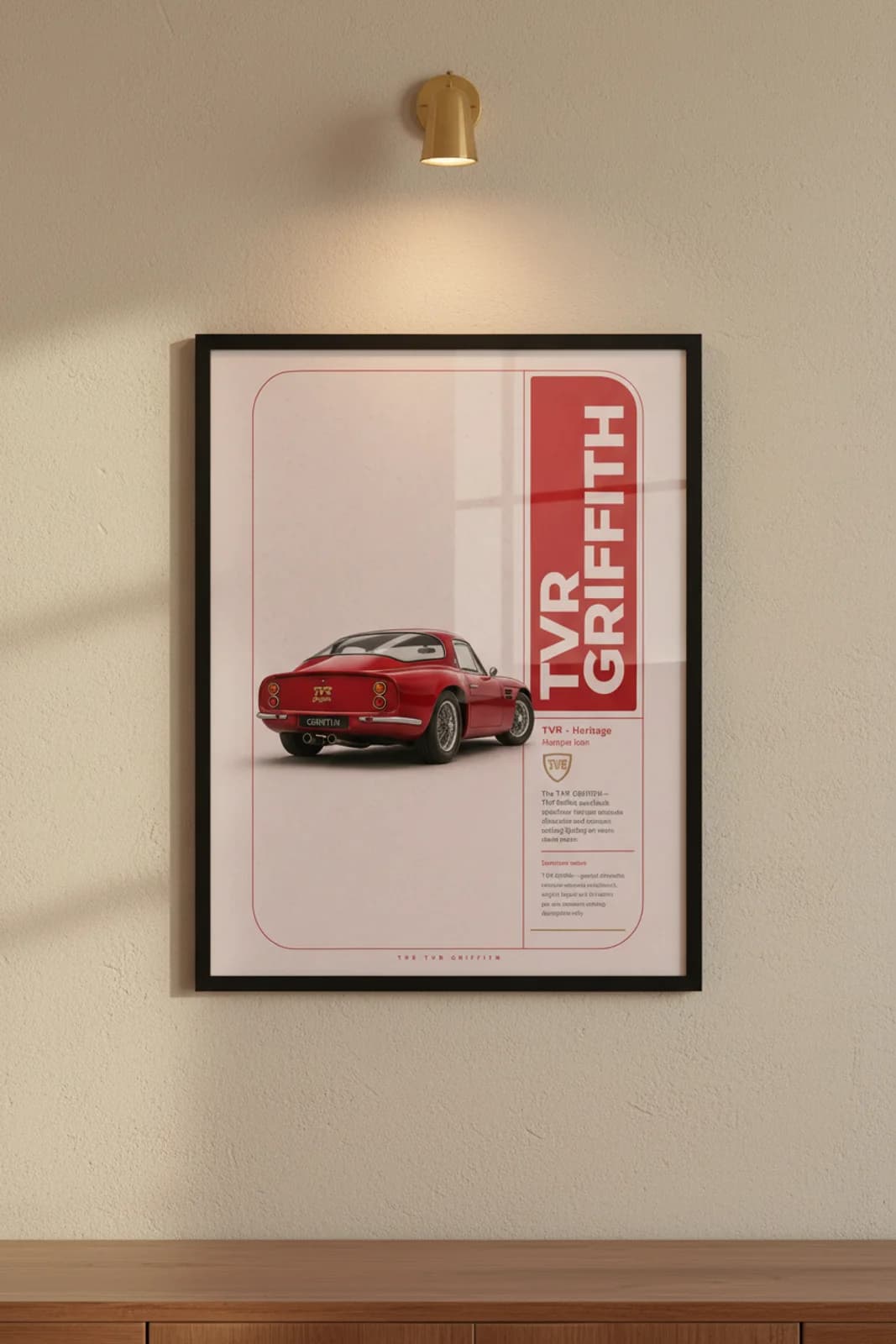 Griffith poster in black A2 frame on tvr-red lime-wash wall — Heritage Icons collector lounge mockup