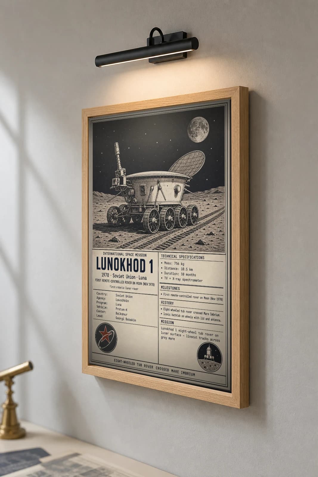 Lunokhod 1 Poster — 1970 Lavochkin International Space Mission Print · framed A2 — the framed print shown at a three-quarter angle on a styled gallery wall in a natural-oak frame