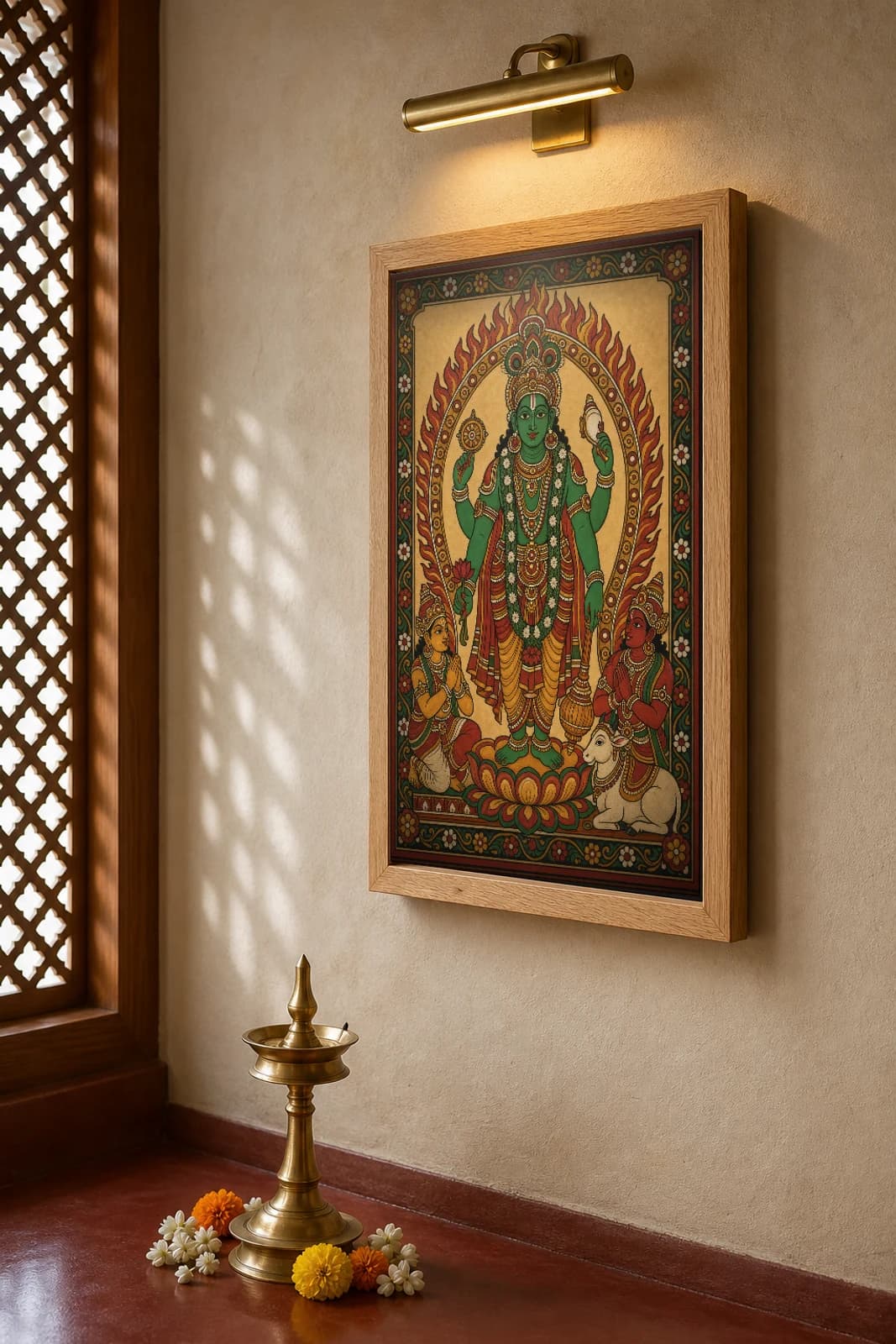 Guruvayurappan Kerala Mural Art Print — four-armed Krishna of Guruvayur in flat panchavarna bhitti-chitra style, collector edition of 500 — the framed print shown at a three-quarter angle on a styled gallery wall in a natural-oak frame