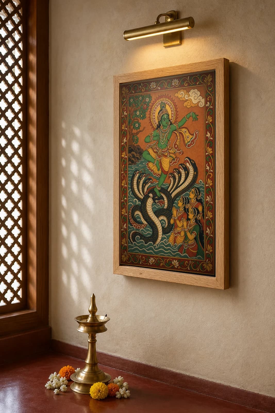 Kaliya Mardana Kerala Mural Art Print — Krishna dancing on the serpent Kaliya in flat panchavarna bhitti-chitra style, collector edition of 500 — the framed print shown at a three-quarter angle on a styled gallery wall in a natural-oak frame